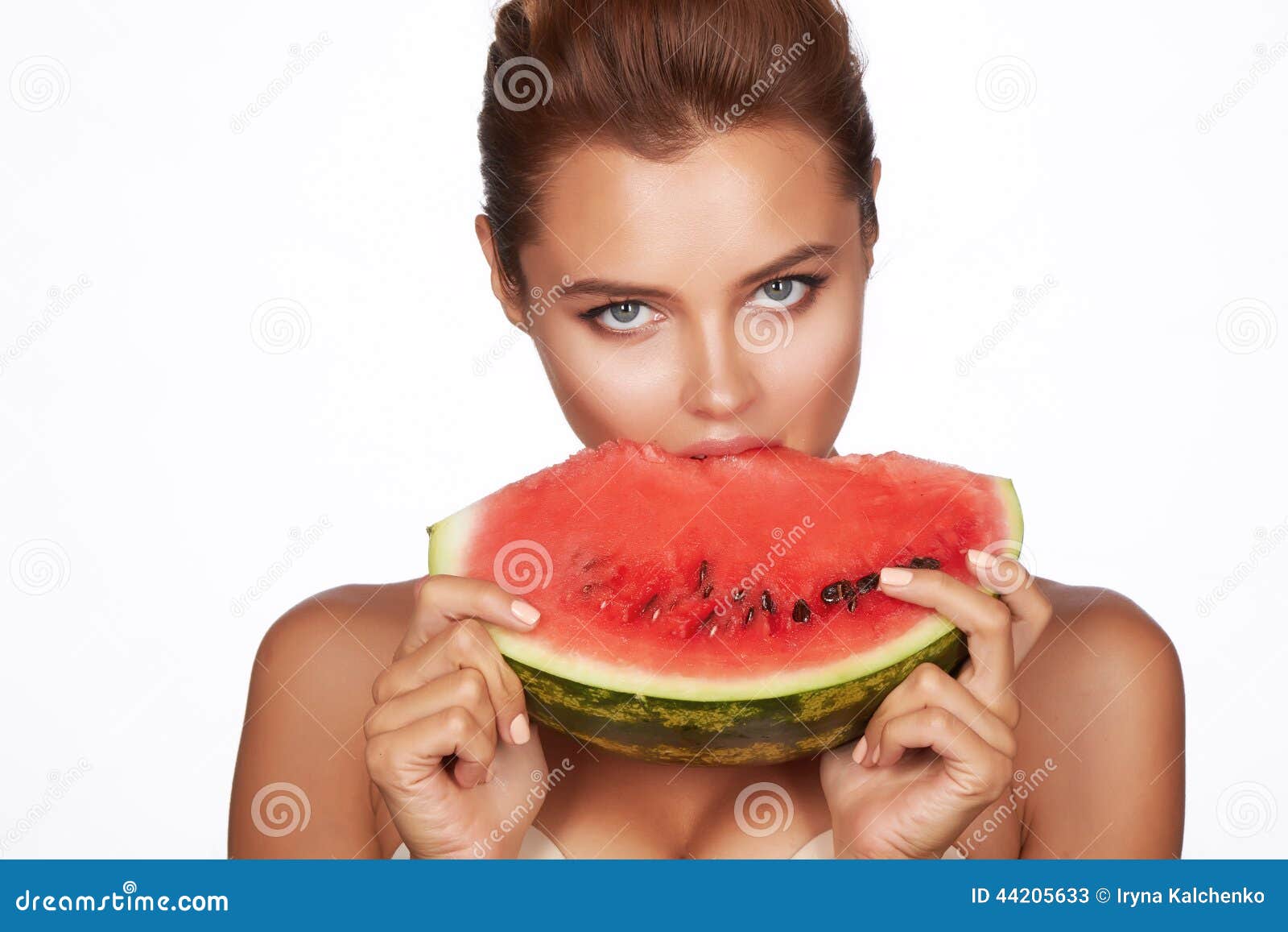 Beautiful Brunette Woman Eating Watermelon On A White Beautiful Brunette Woman Eating Watermelon On A White