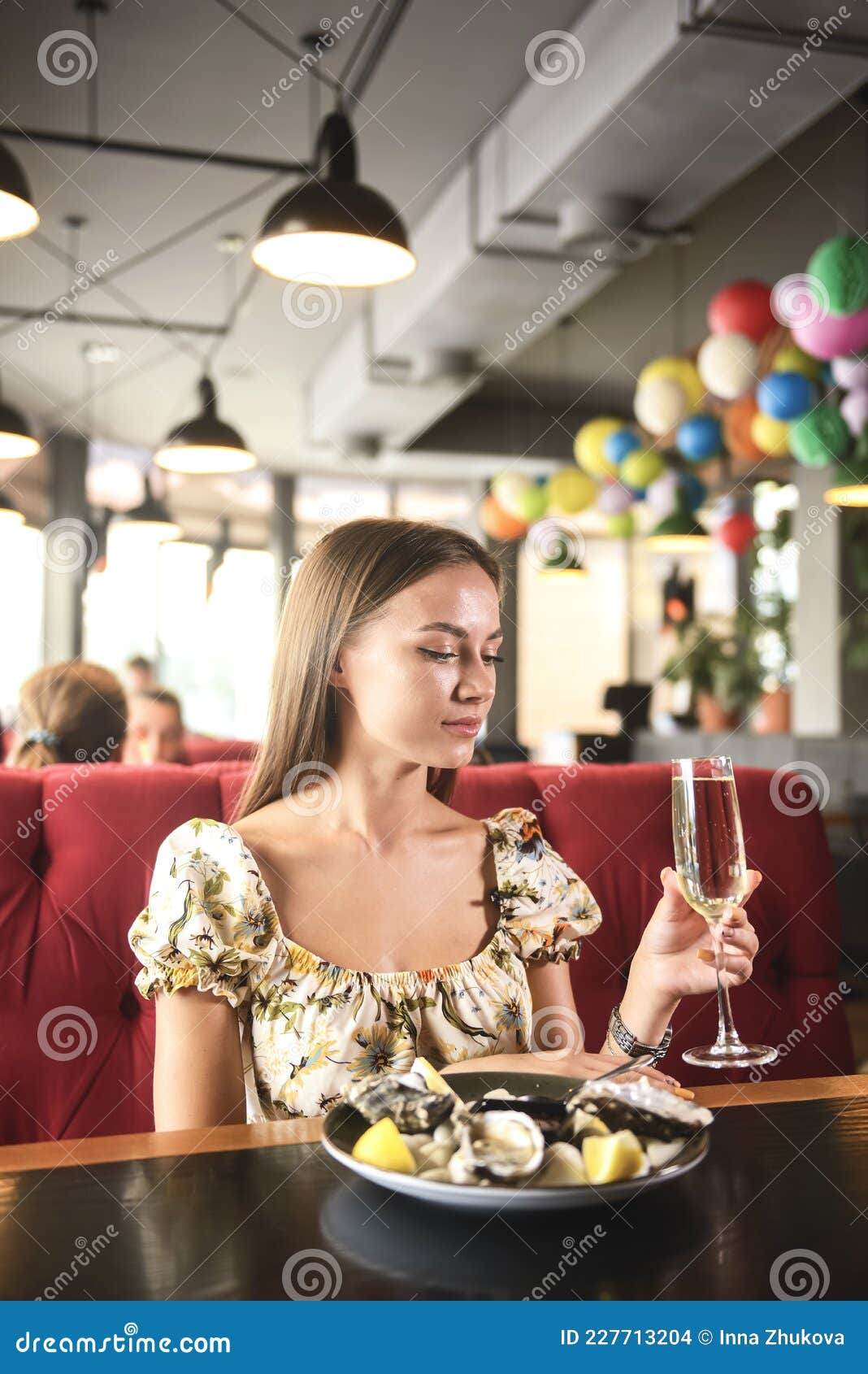 Beautiful Brunette Woman in Expensive Restaurant Eating Oysters and ...