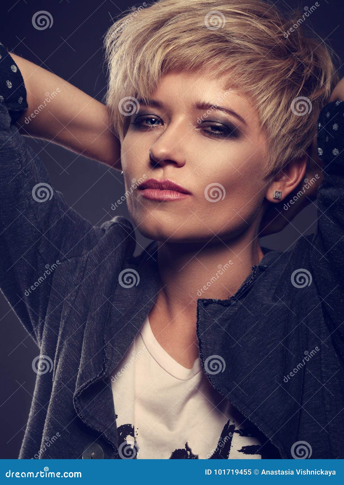 beautiful cocky woman with short bob blond hairstyle and bl