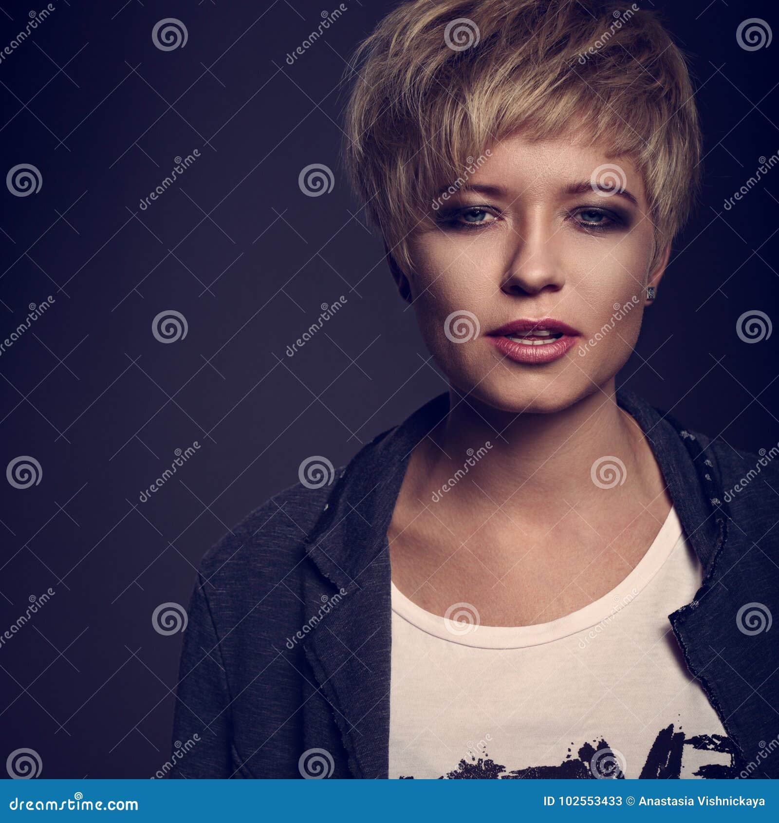 beautiful cocky woman with short bob blond hairstyle in fas