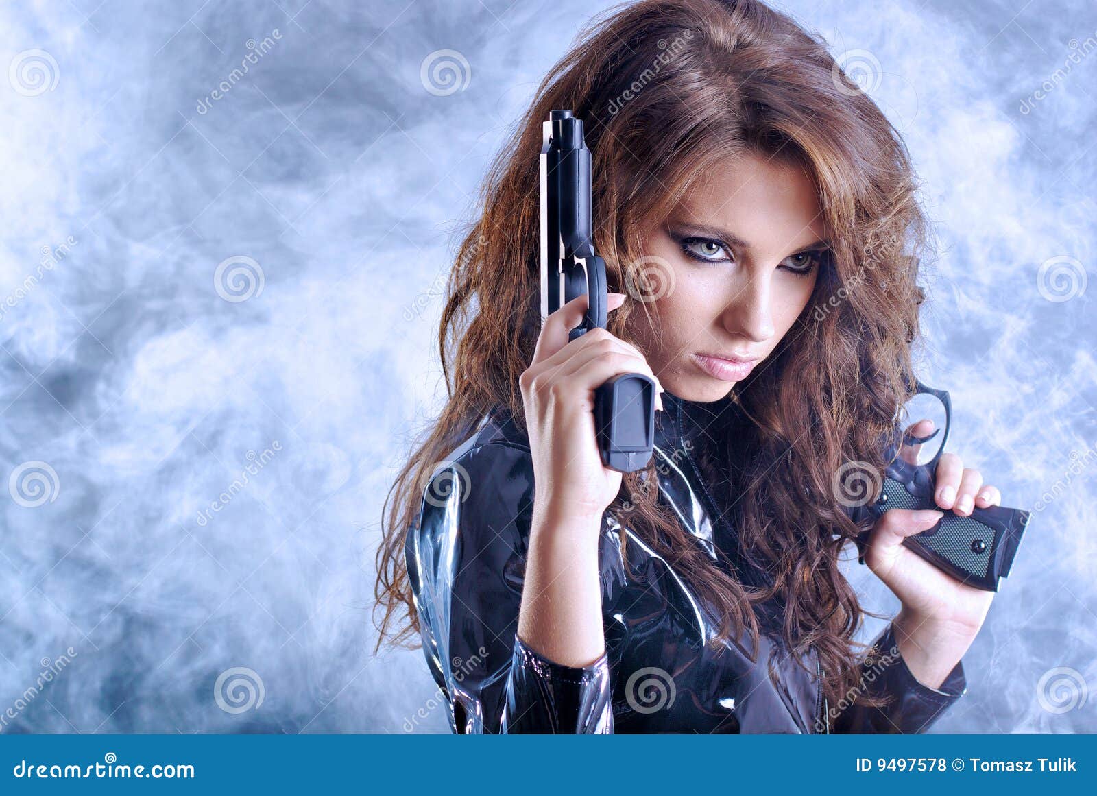 Beautiful girl holding gun stock photo. Image of black - 9497578