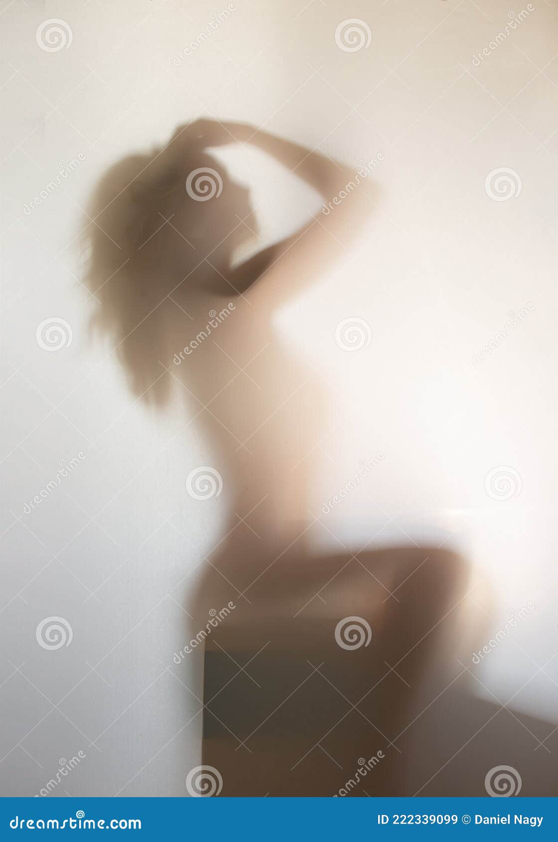 Erotic tits on blurred glass