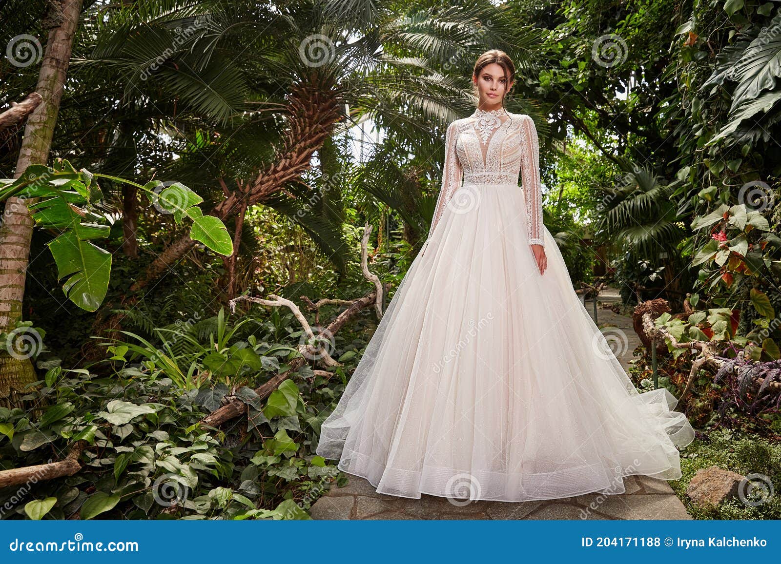 beautiful sexy woman model bride wearing white long silk and lace wedding dress fashion espousal bright makeup brunette hairstyle