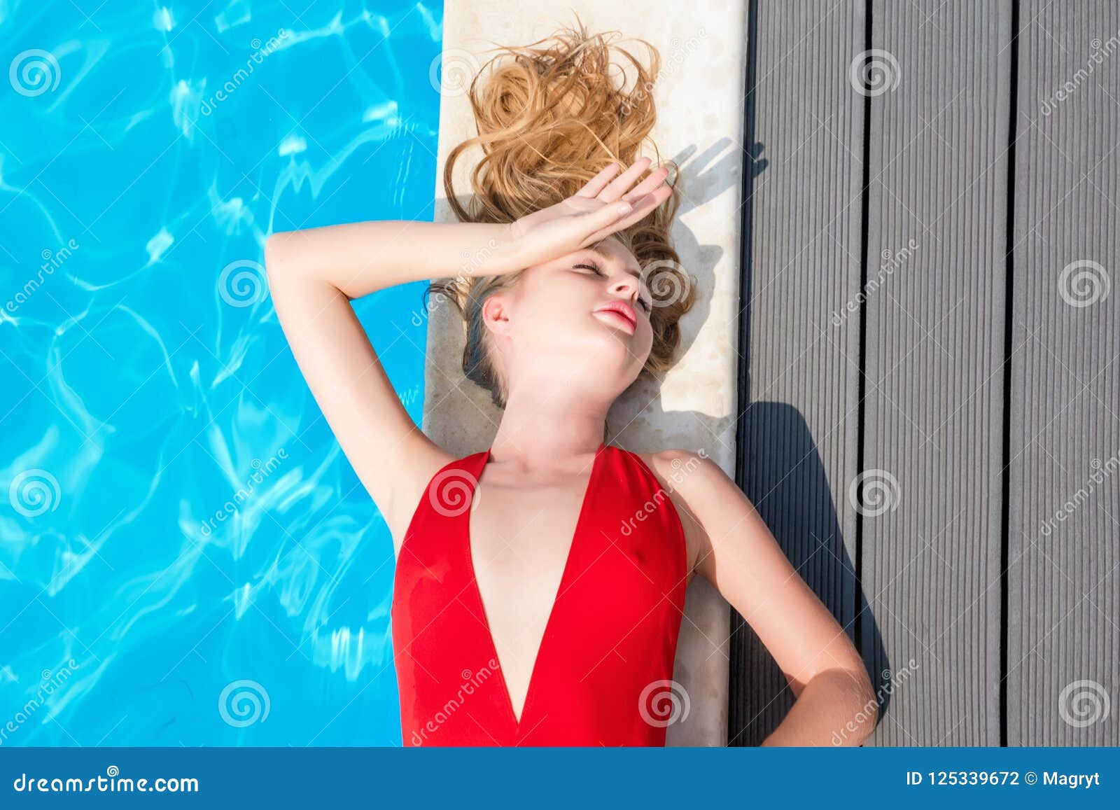 Beautiful Woman Relaxing In Swimming Pool Blonde Girl With Gorgeous Face Fashion Makeup And