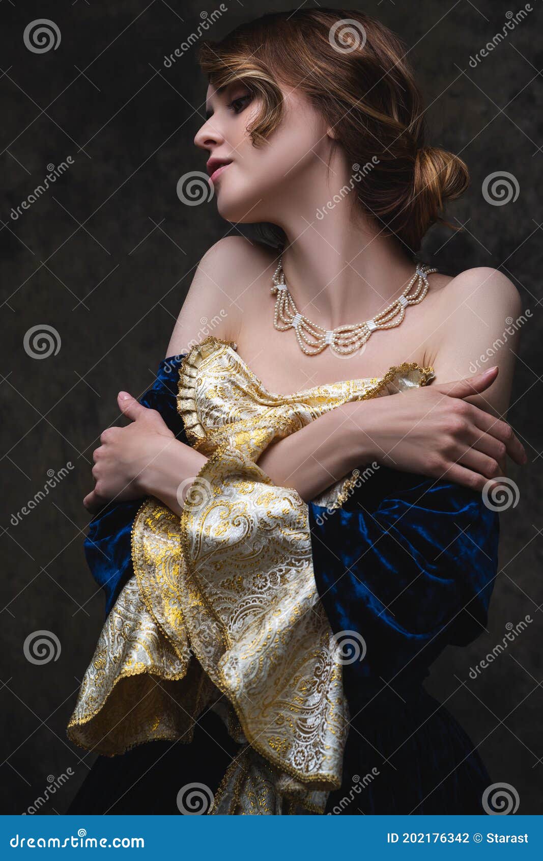 beautiful sexy woman in renaissance dress on abstract dark background