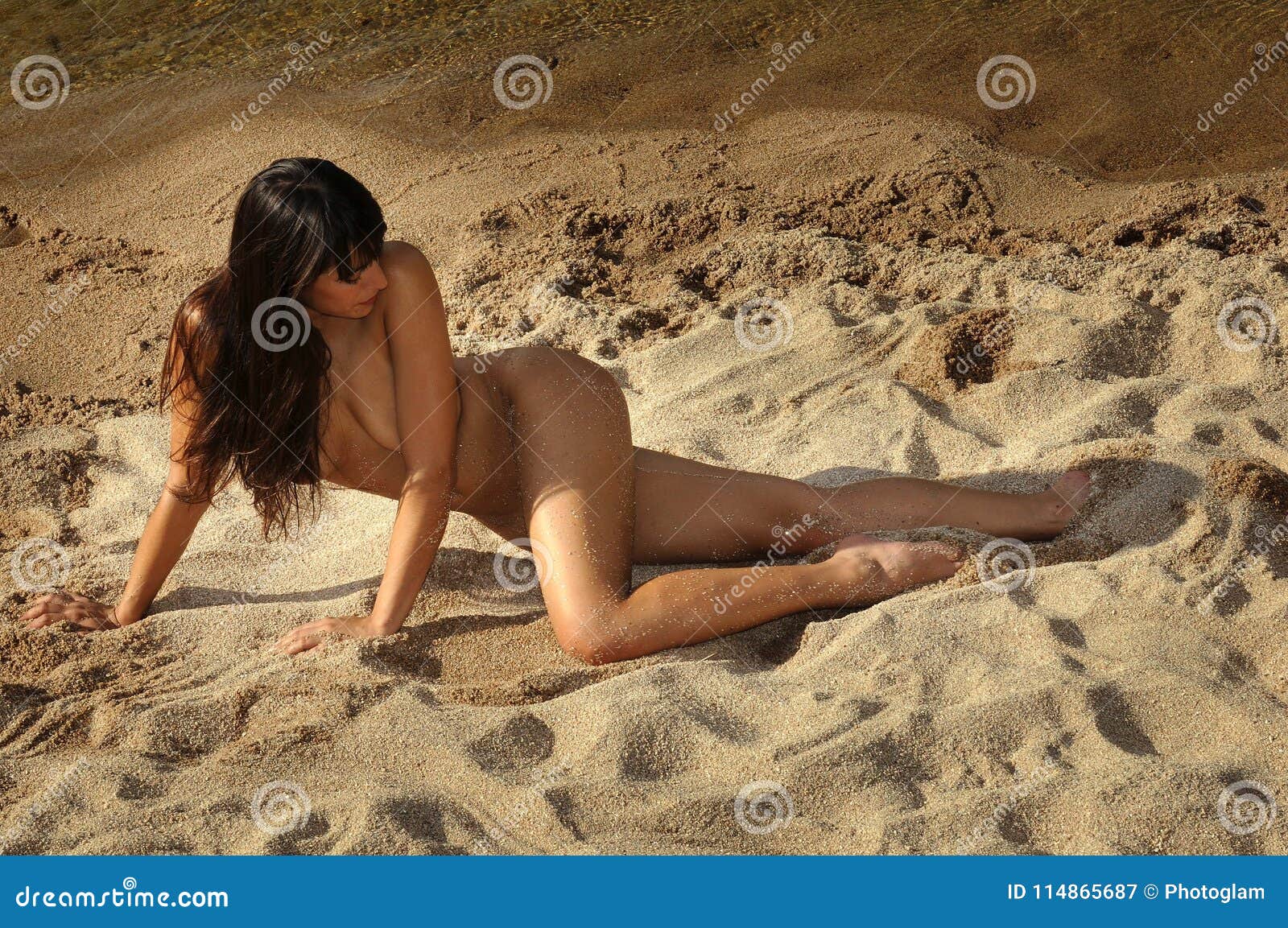 Sexy brunette girl Topless on the Beach