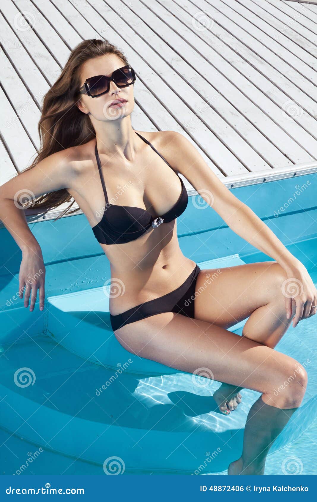 Slim Girl, Small Breasts Teenage Girl In Black Swimsuit Stock Photo,  Picture and Royalty Free Image. Image 174580165.