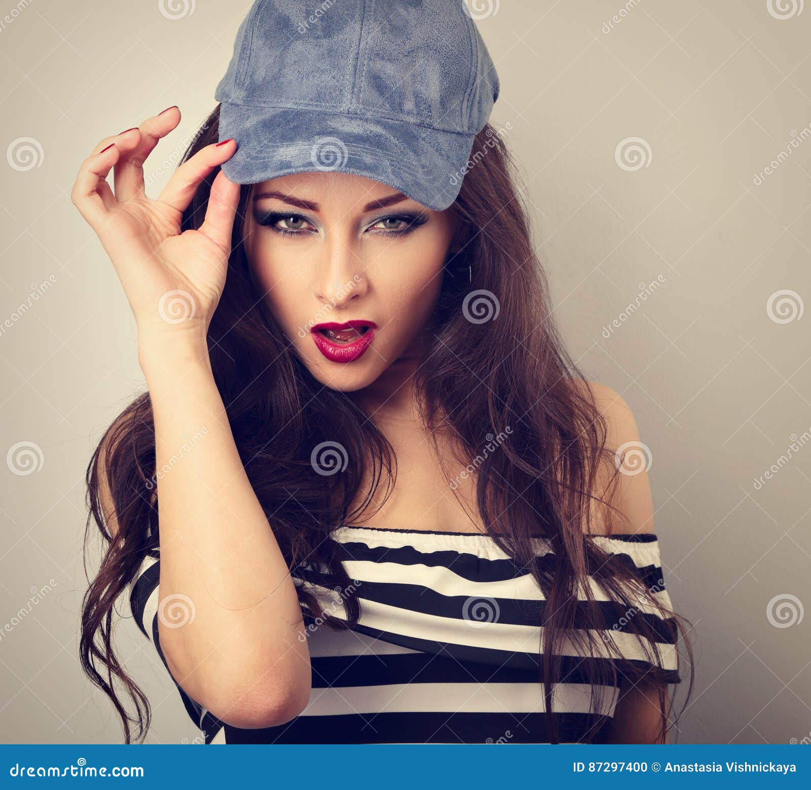 Beautiful Young Make-up Model Holding Fashion Blue Cap and Stock Photo ...
