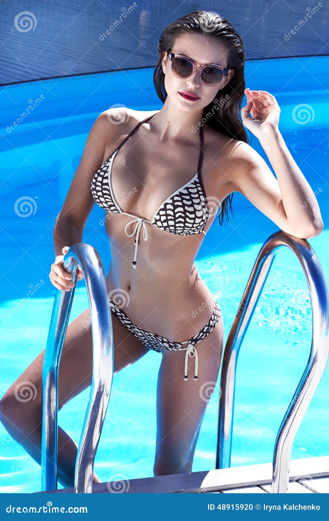 Slim Girl, Small Breasts Teenage Girl In Black Swimsuit Stock Photo,  Picture and Royalty Free Image. Image 174580165.