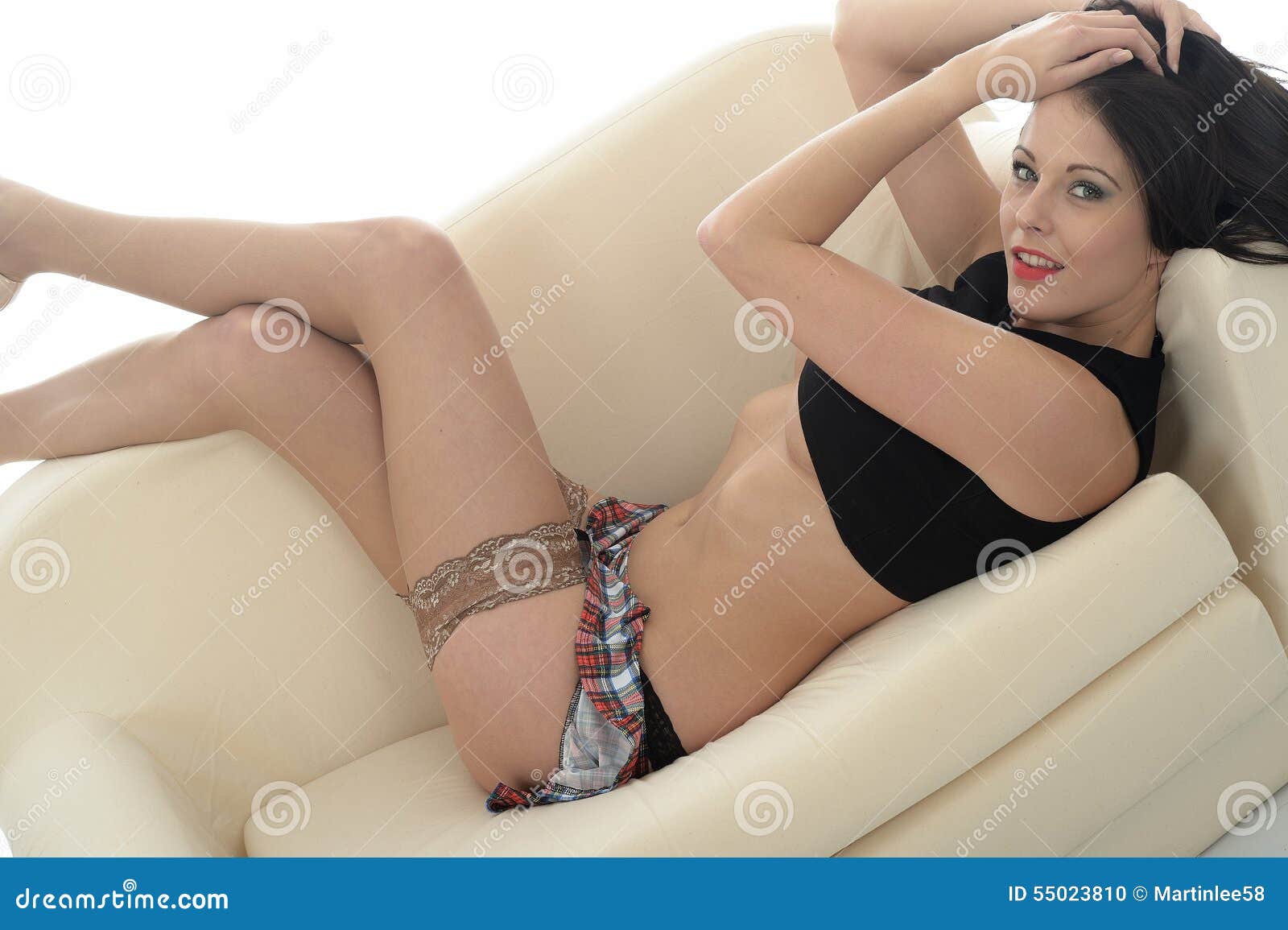 Beautiful Young Woman Wearing a Short Mini Skirt Nude Stock Stock Photo