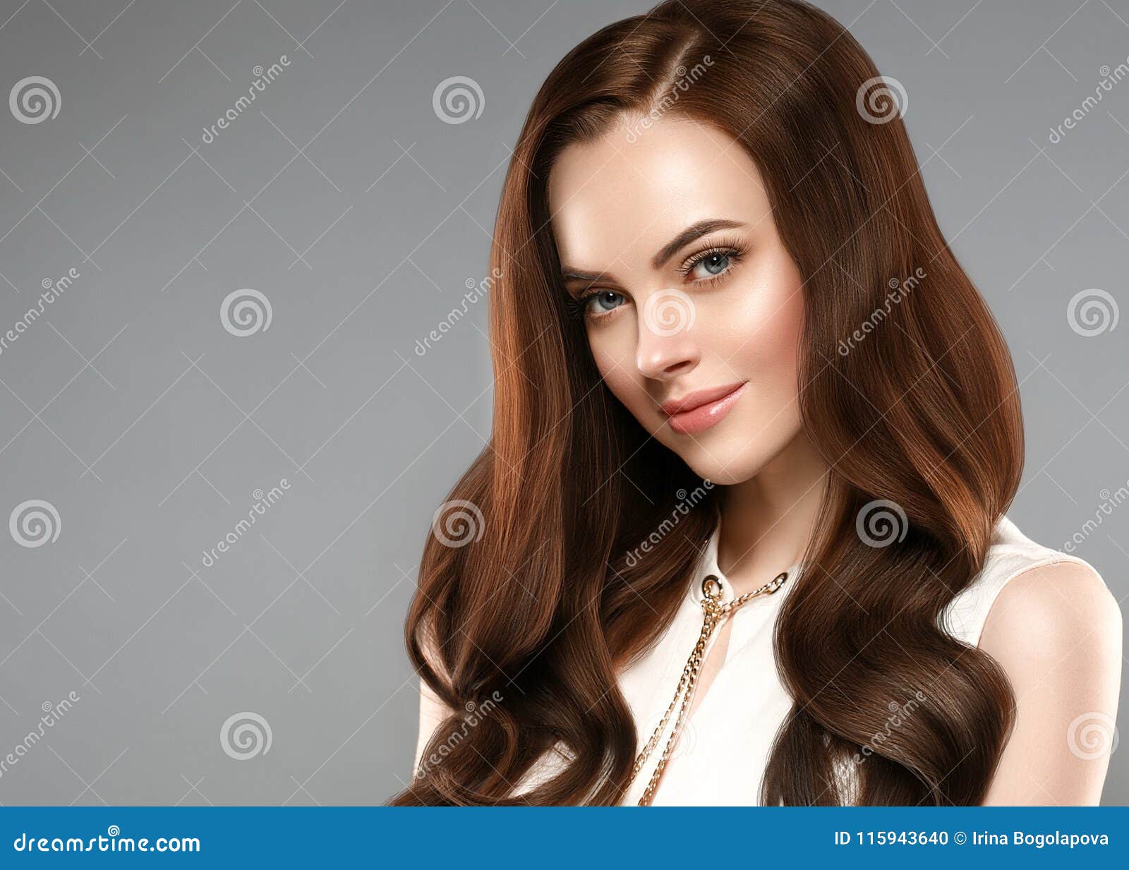 beautiful shine hair woman with manicure nails hand. brunette wi