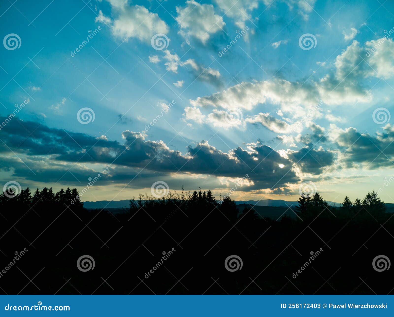 Beautiful Shining Sun Behind Big Clouds at Sunset Stock Image Image
