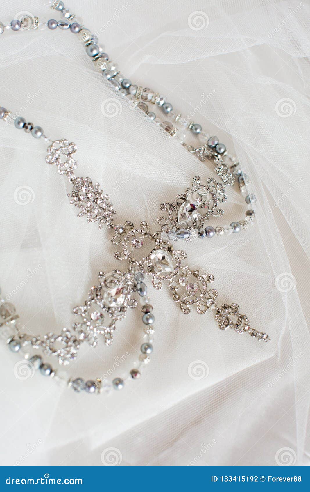 beautiful silver crown on a grey background