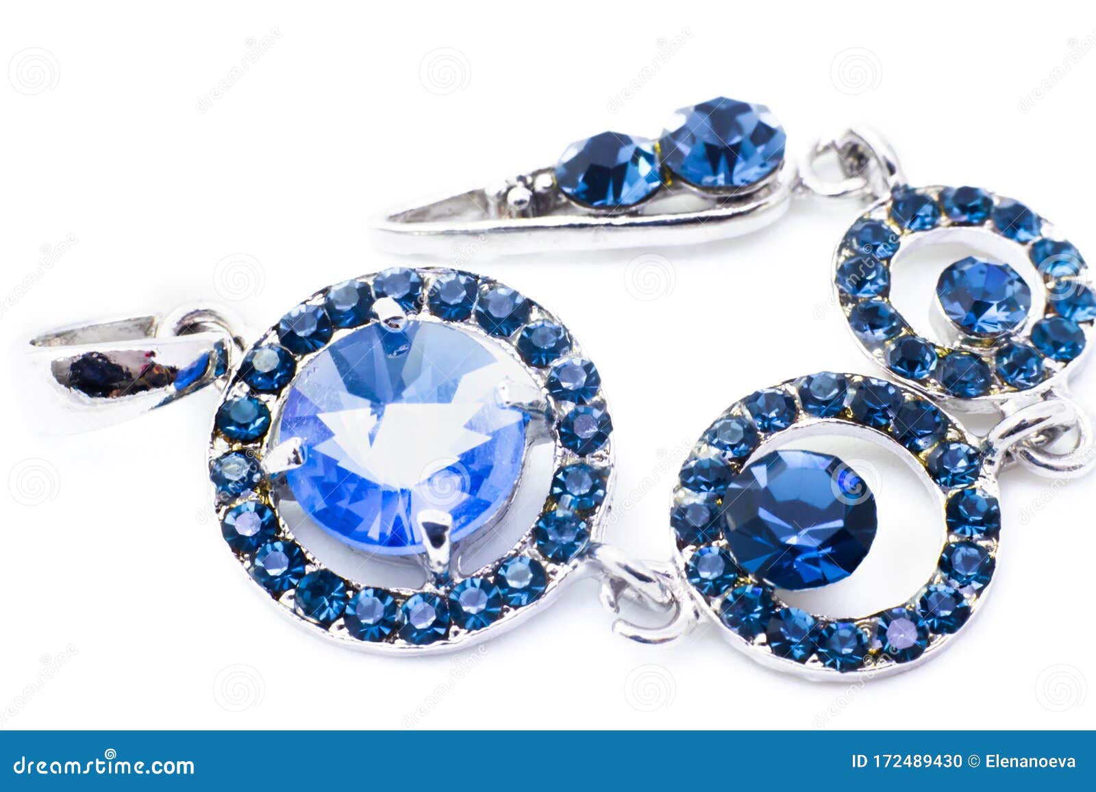 Beautiful Silver Pendant with Blue Stones Isolated on White Background