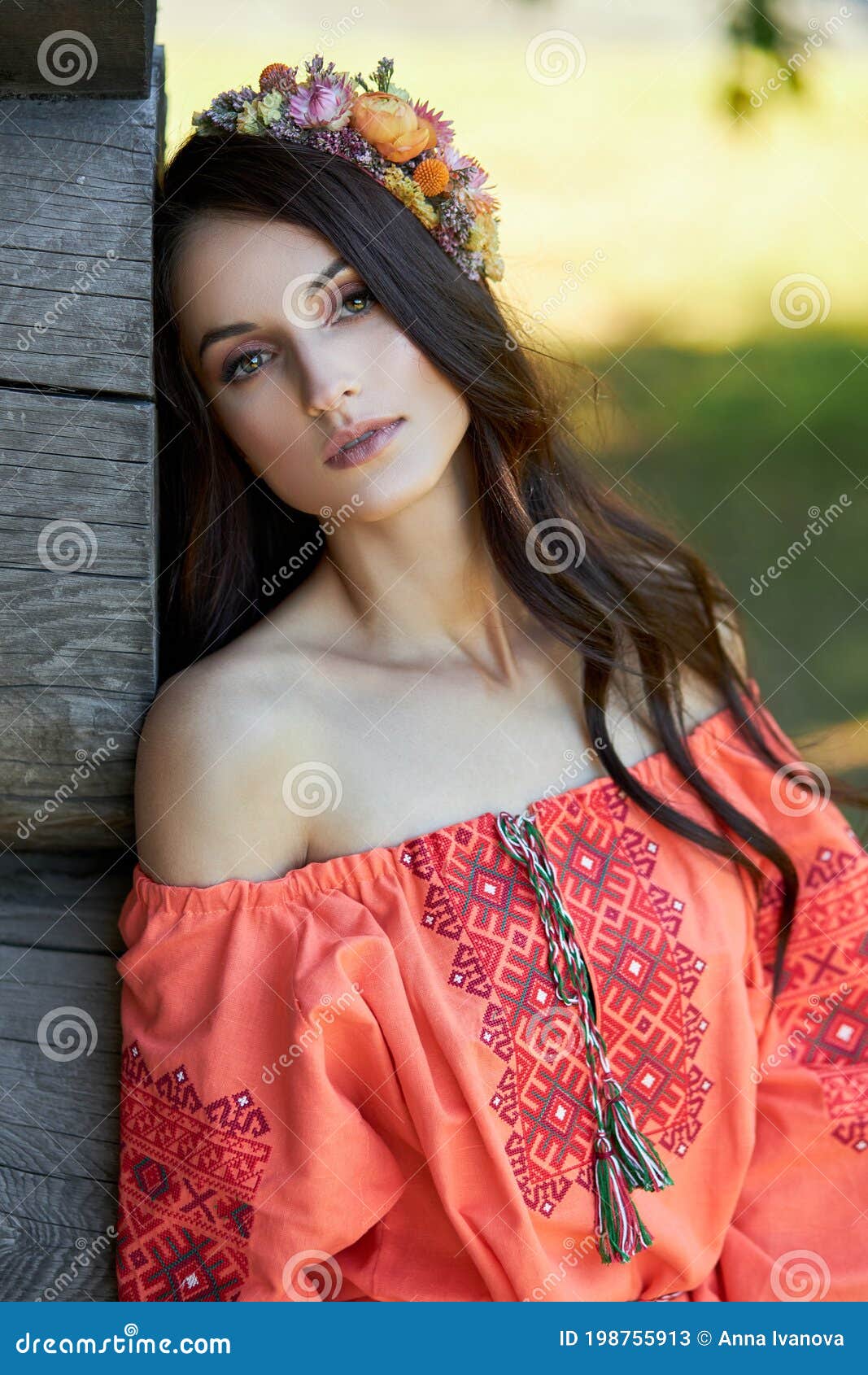 Beautiful Slavic Woman in an Orange Ethnic Dress and a Wreath of ...
