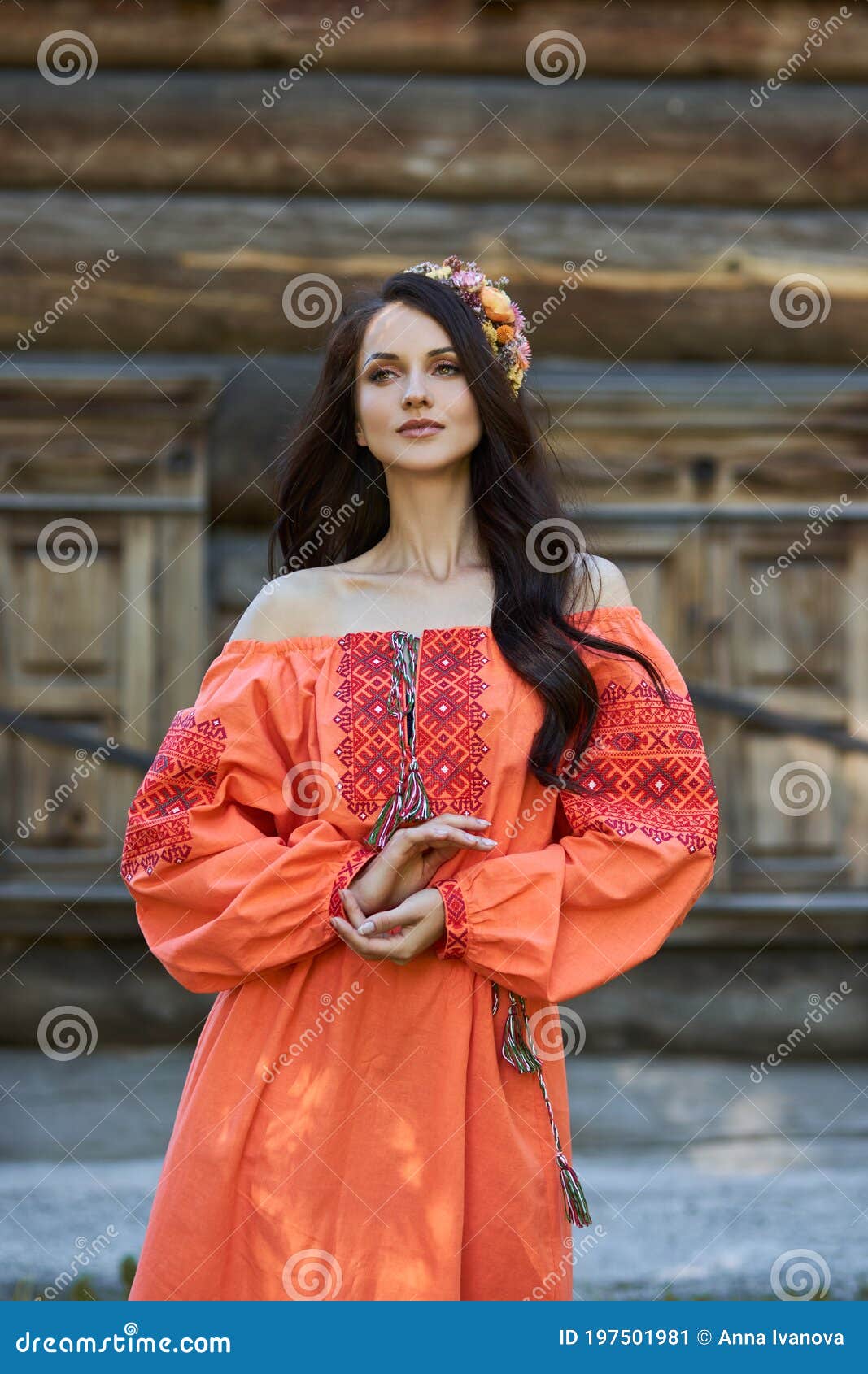 Beautiful Slavic Woman in an Orange Ethnic Dress and a Wreath of ...