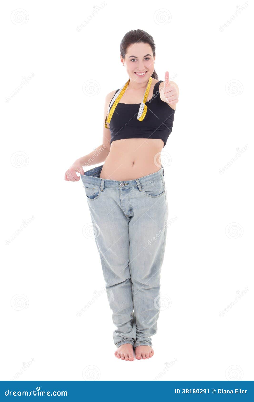 Beautiful Slim Girl in Big Jeans Isolated on White Stock Image - Image ...