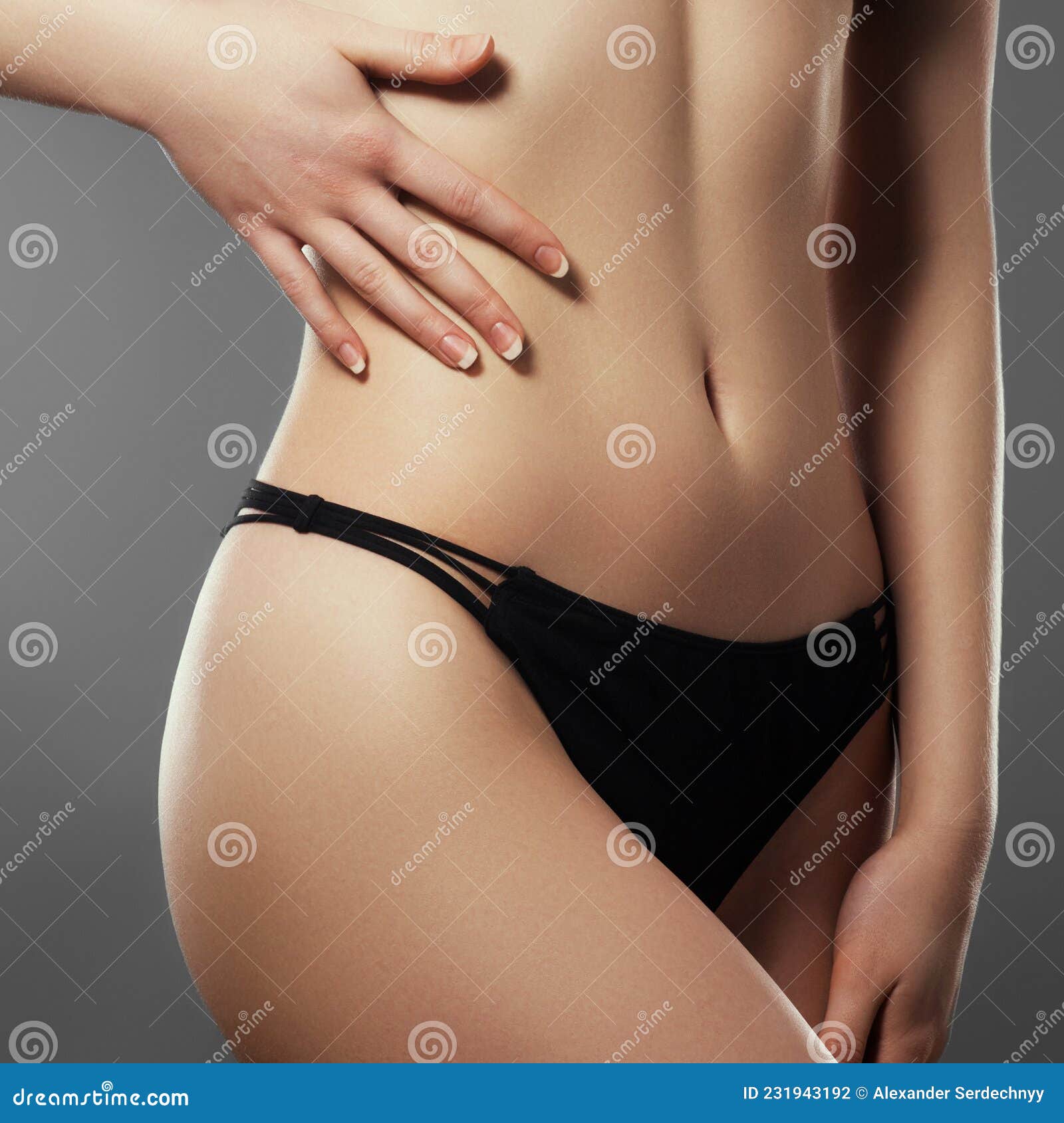 Close up view of stomach. Beautiful woman with slim body in underwear is in  the studio 15301718 Stock Photo at Vecteezy