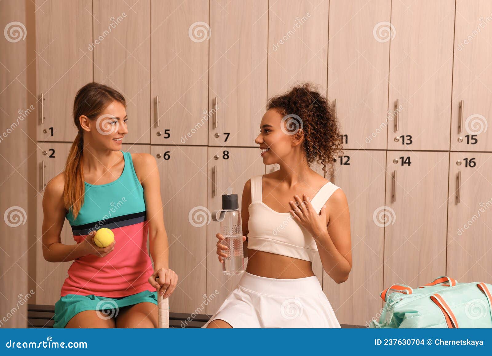 Beautiful Slim Women Talking in Locker Room Stock Photo - Image of ...