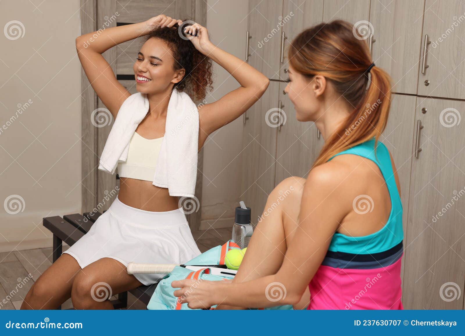 Beautiful Slim Women Talking in Locker Room Stock Image - Image of ...