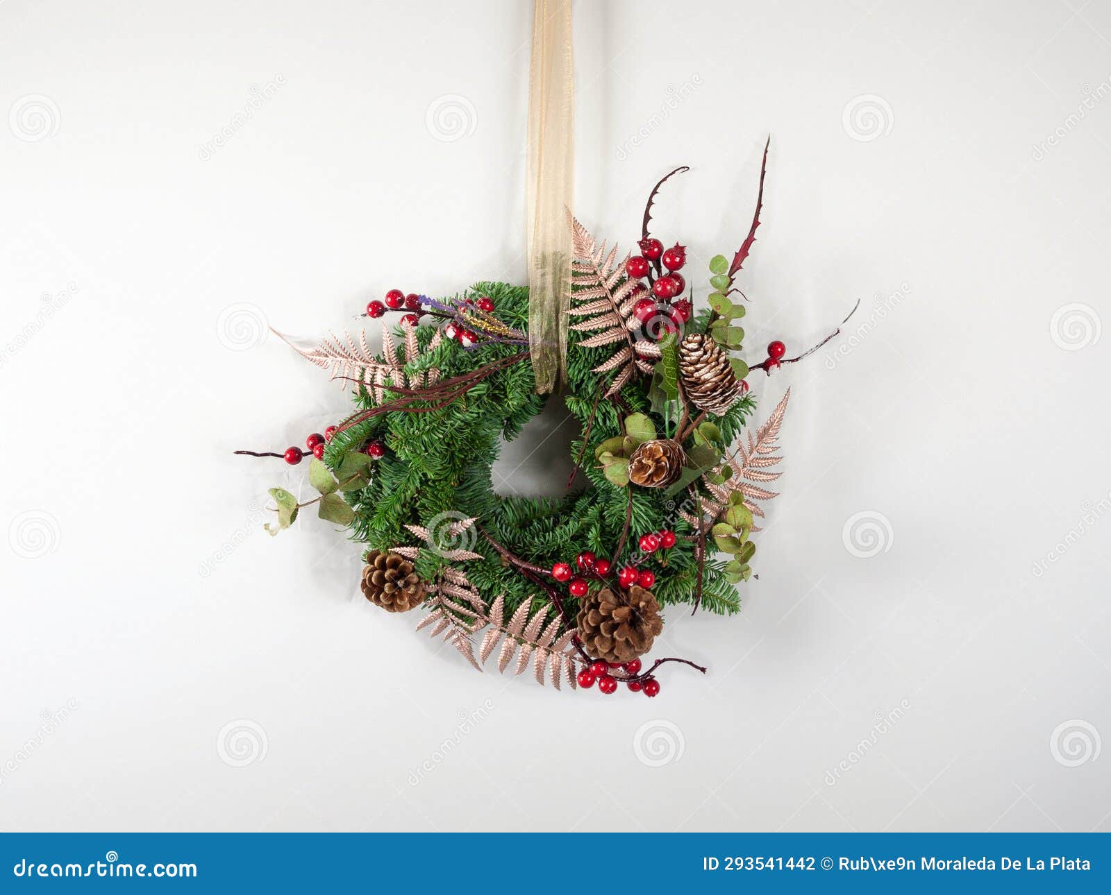 small christmas flower wreath on white background.