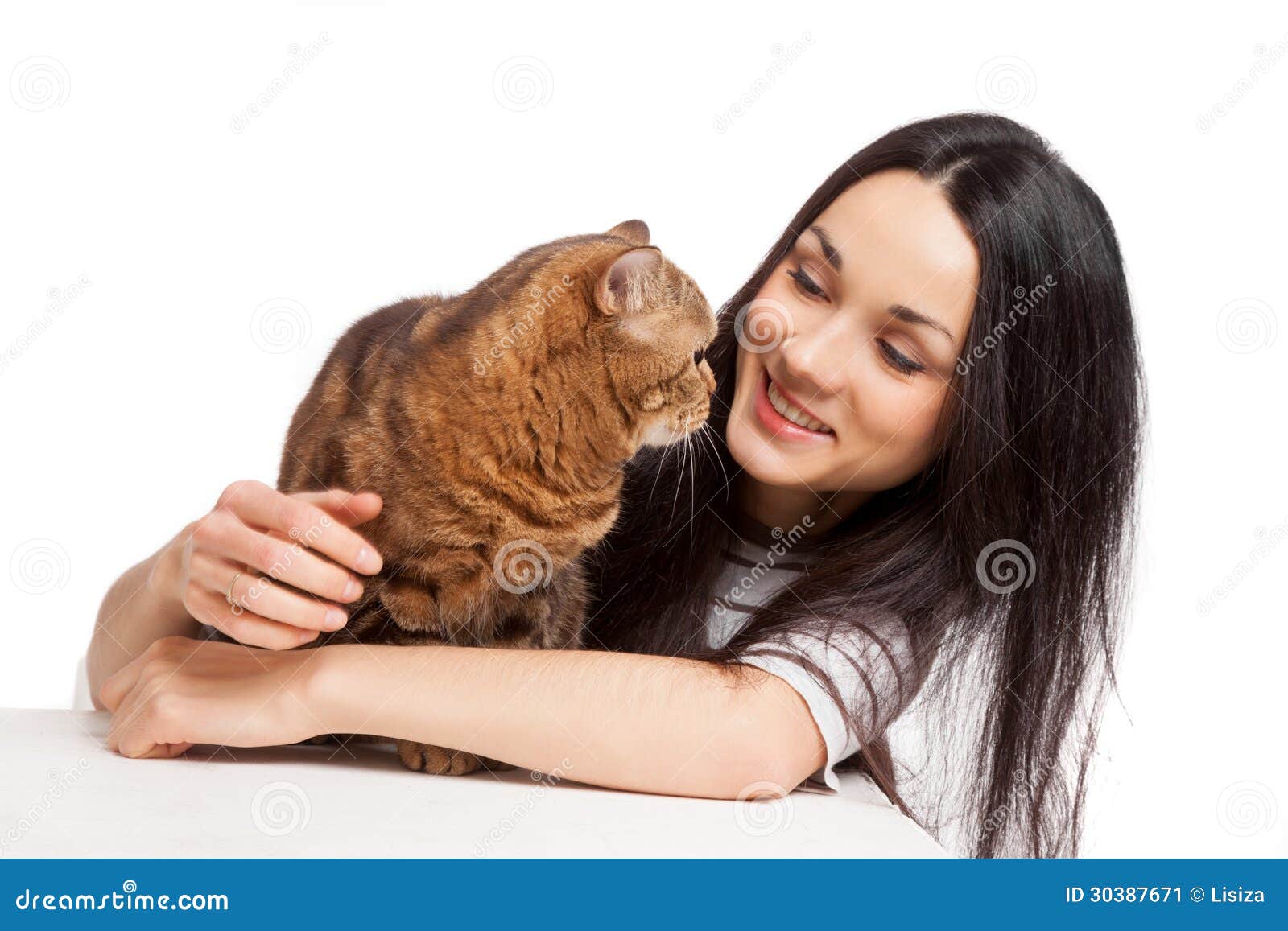 Beautiful Smiling Brunette Girl And Her Ginger Cat Over White Ba Stock