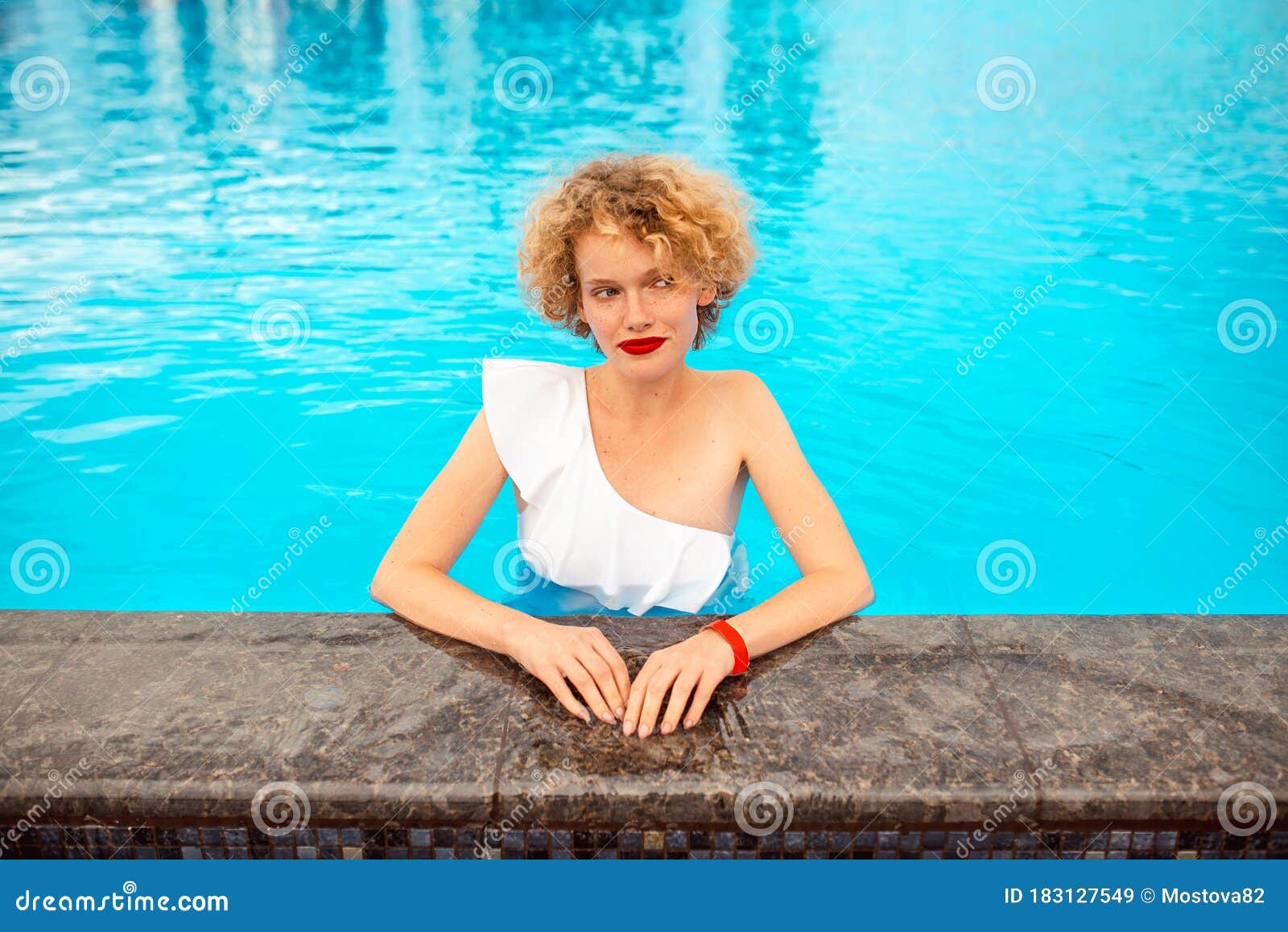 Beautiful Redhead Sitting By The Swimming Pool Stock Image Image Of Leisure Ginger 183127549 