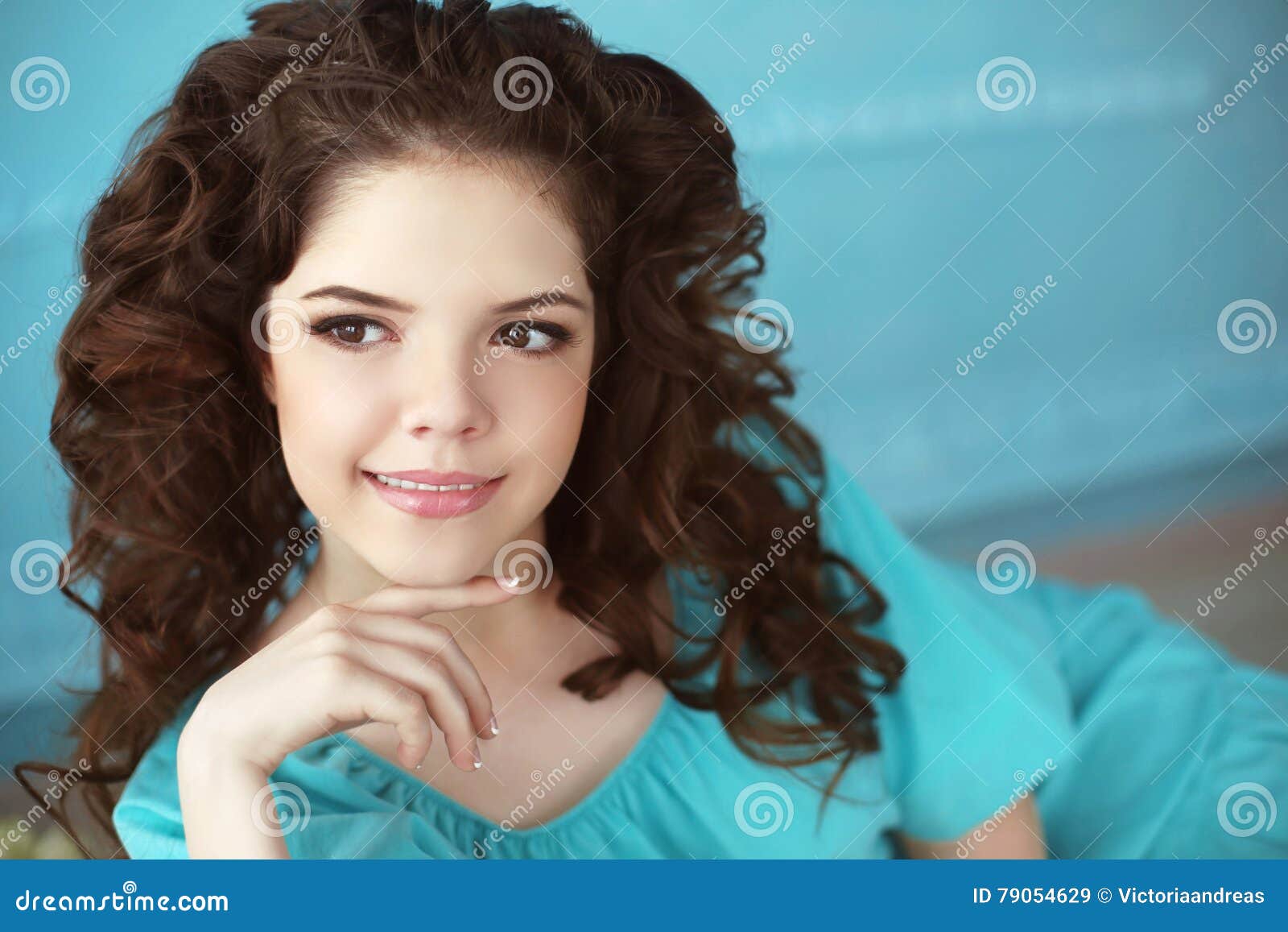 teen brunette curly hair