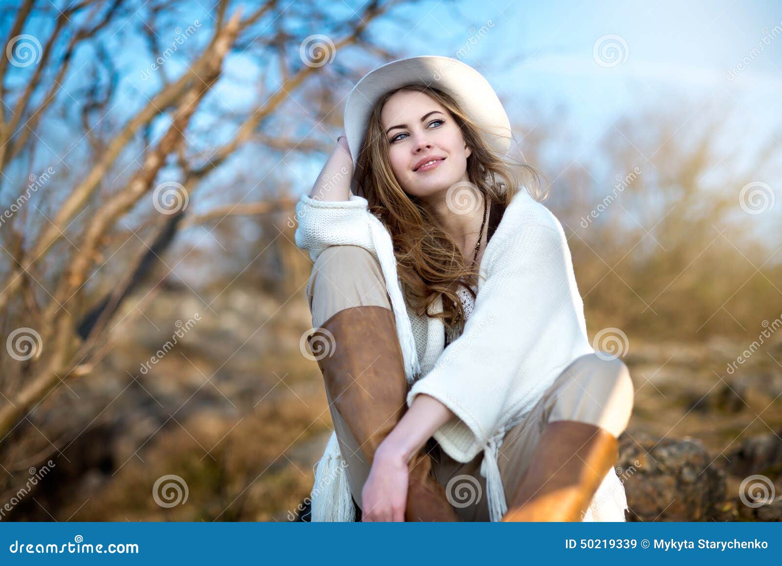 beautiful smiling woman relaxing outdoors