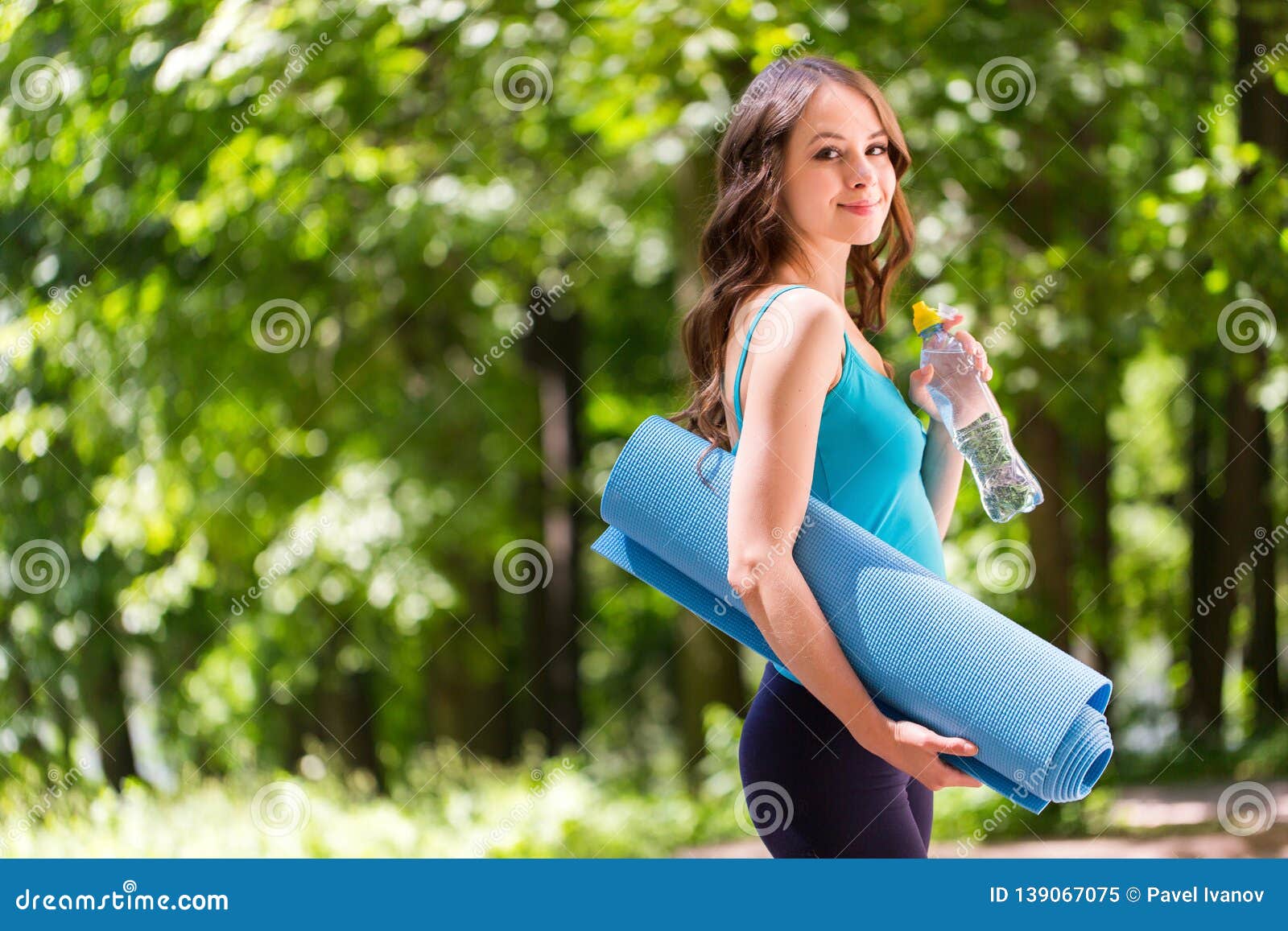 Beautiful Woman with a Yoga Mat Outdoors Stock Image - Image of girl ...