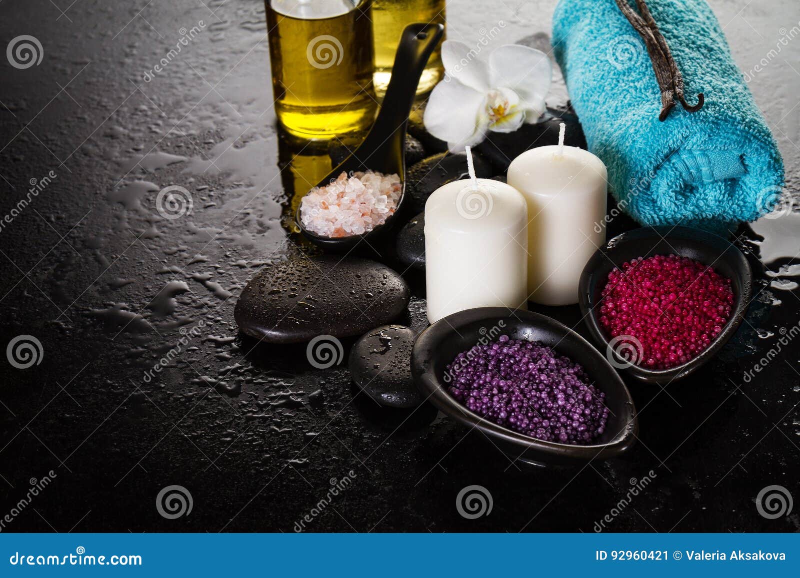 Beautiful Spa Set Spa Products With Essential Oils Soap Towel Spa Sea Salt On Dark Wet