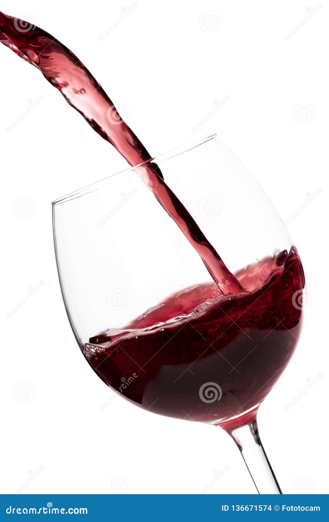 Beautiful Splash Of Red Wine In A Glass On White Background Stock Photo