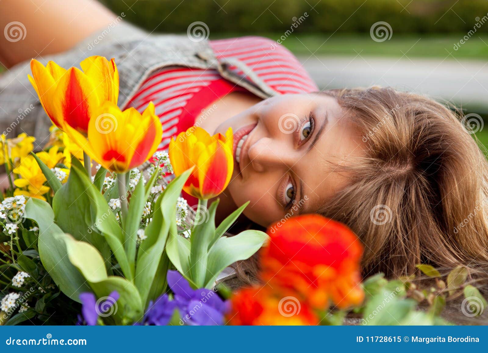 Beautiful Spring Portrait with Tulips. Stock Image - Image of happy