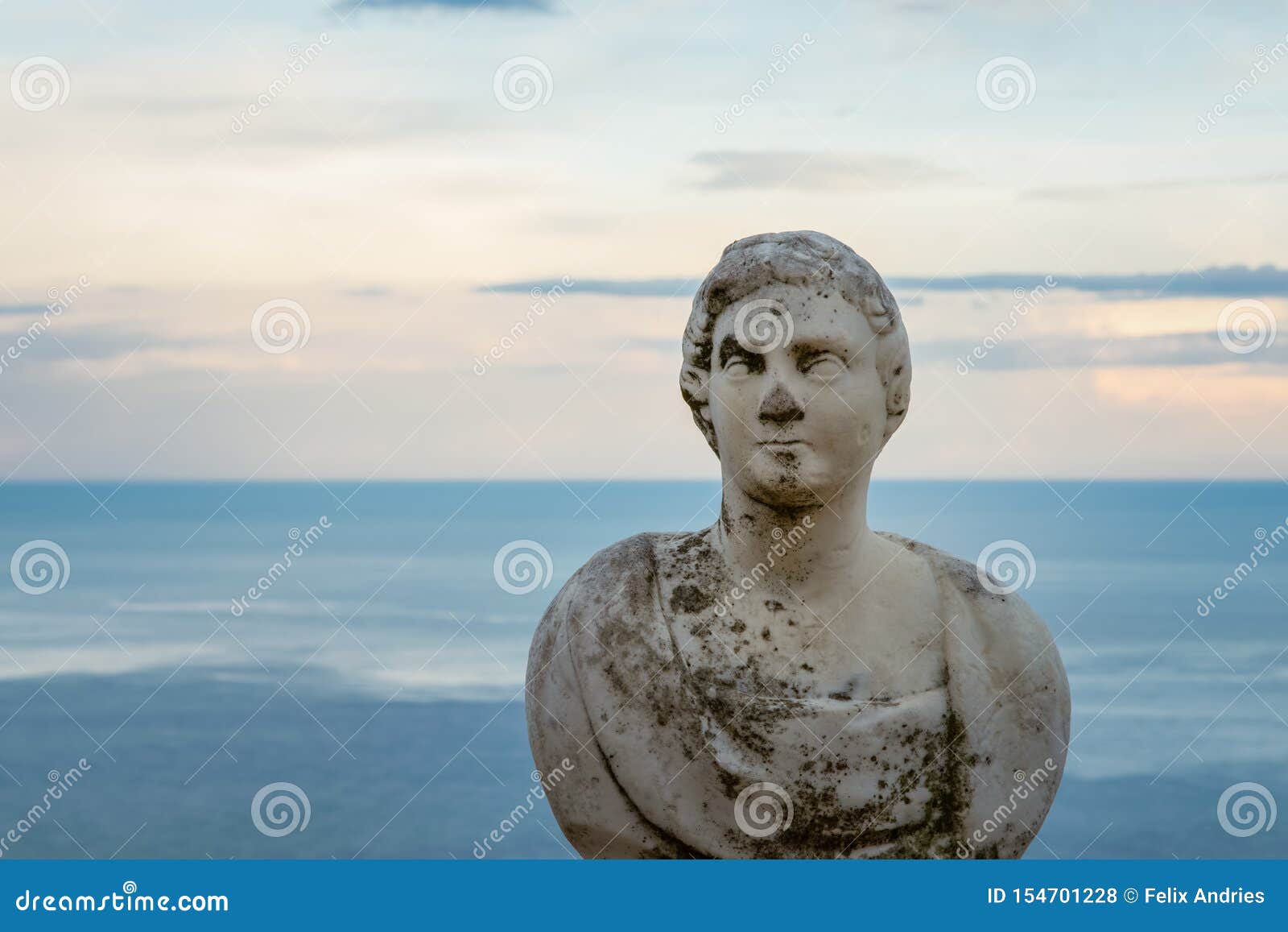 beautiful statue from the belvedere, the so-called terrazza dell`infinito, the terrace of infinity seen on the sunset, villa cimbr