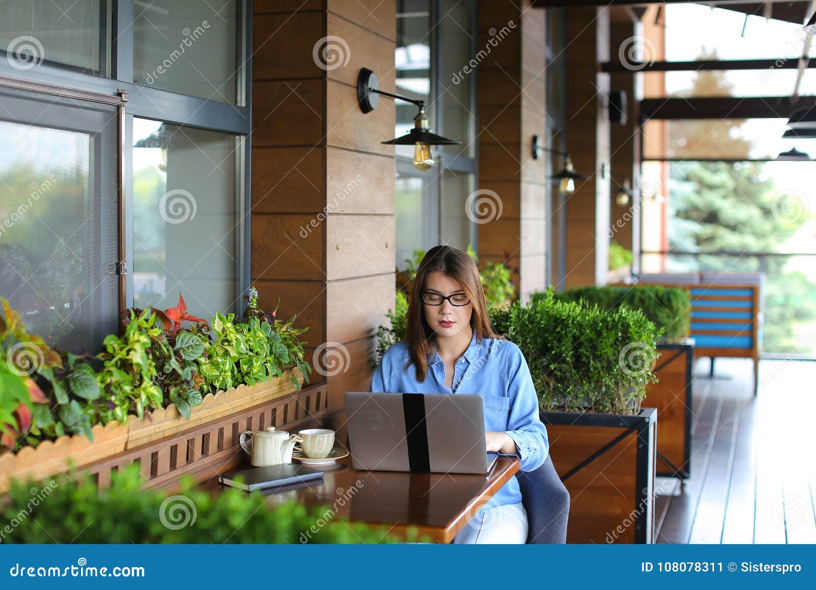 Beautiful Student Working with Laptop at Restaurant. Stock Image ...