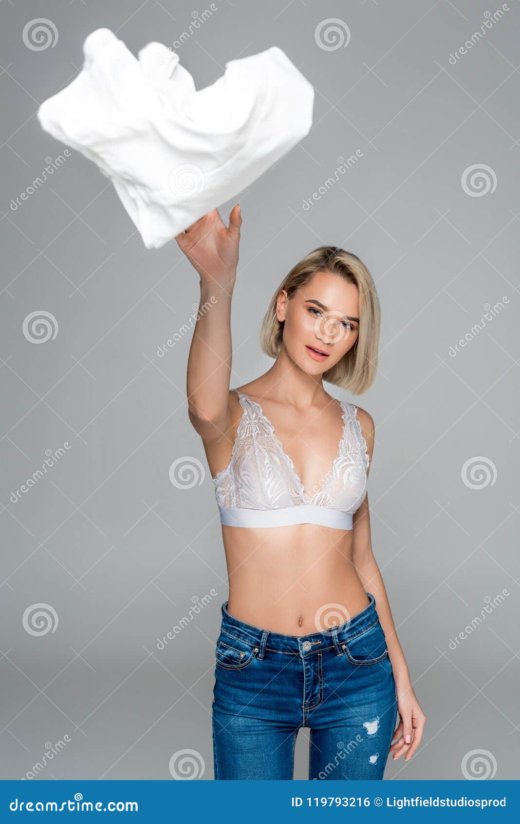 Beautiful Stylish Girl in Bra Throwing Away Clothes, Stock Photo - Image of  clothes, girl: 119793216