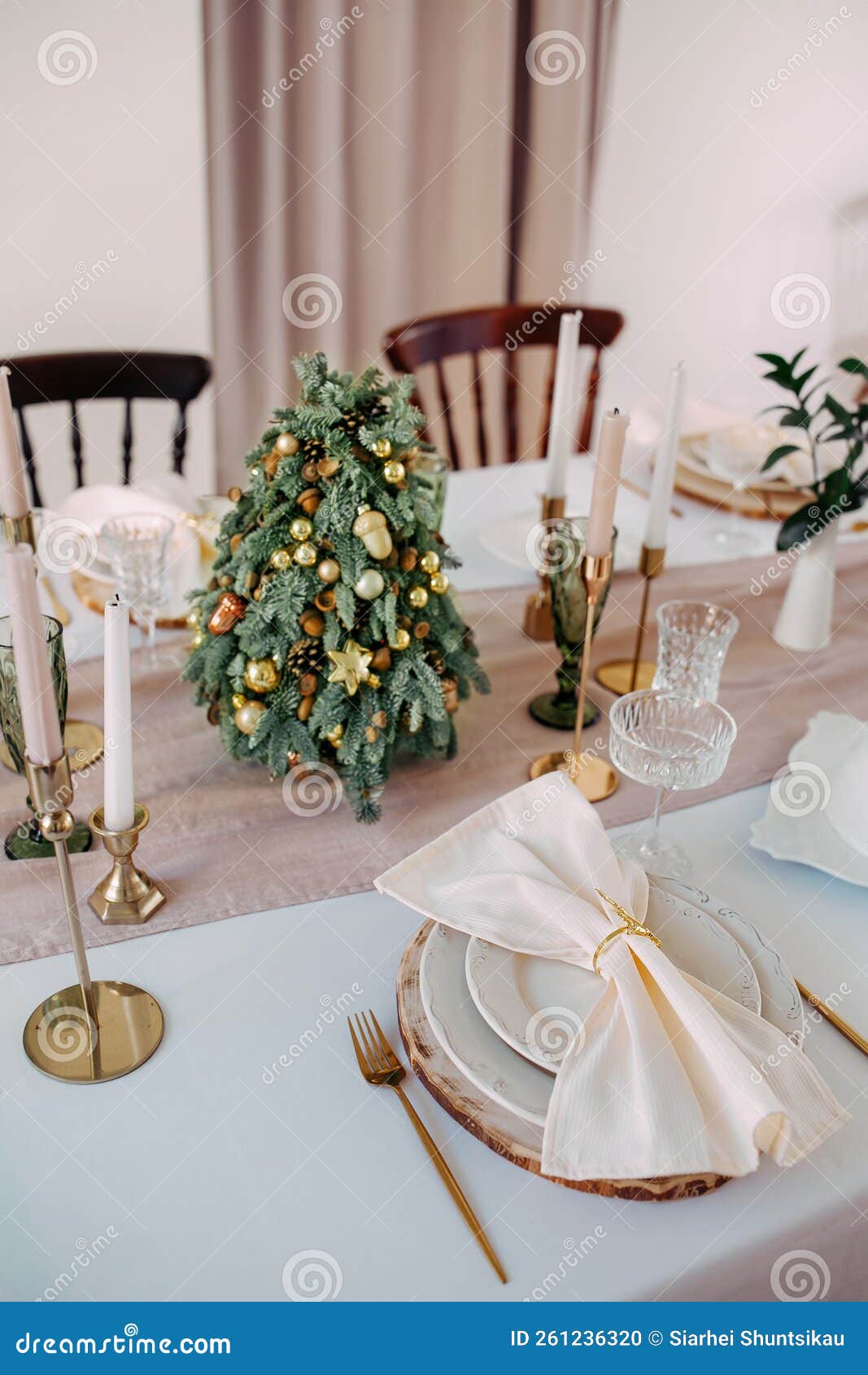 Beautiful and Stylish Table Setting with Christmas Decorations in the