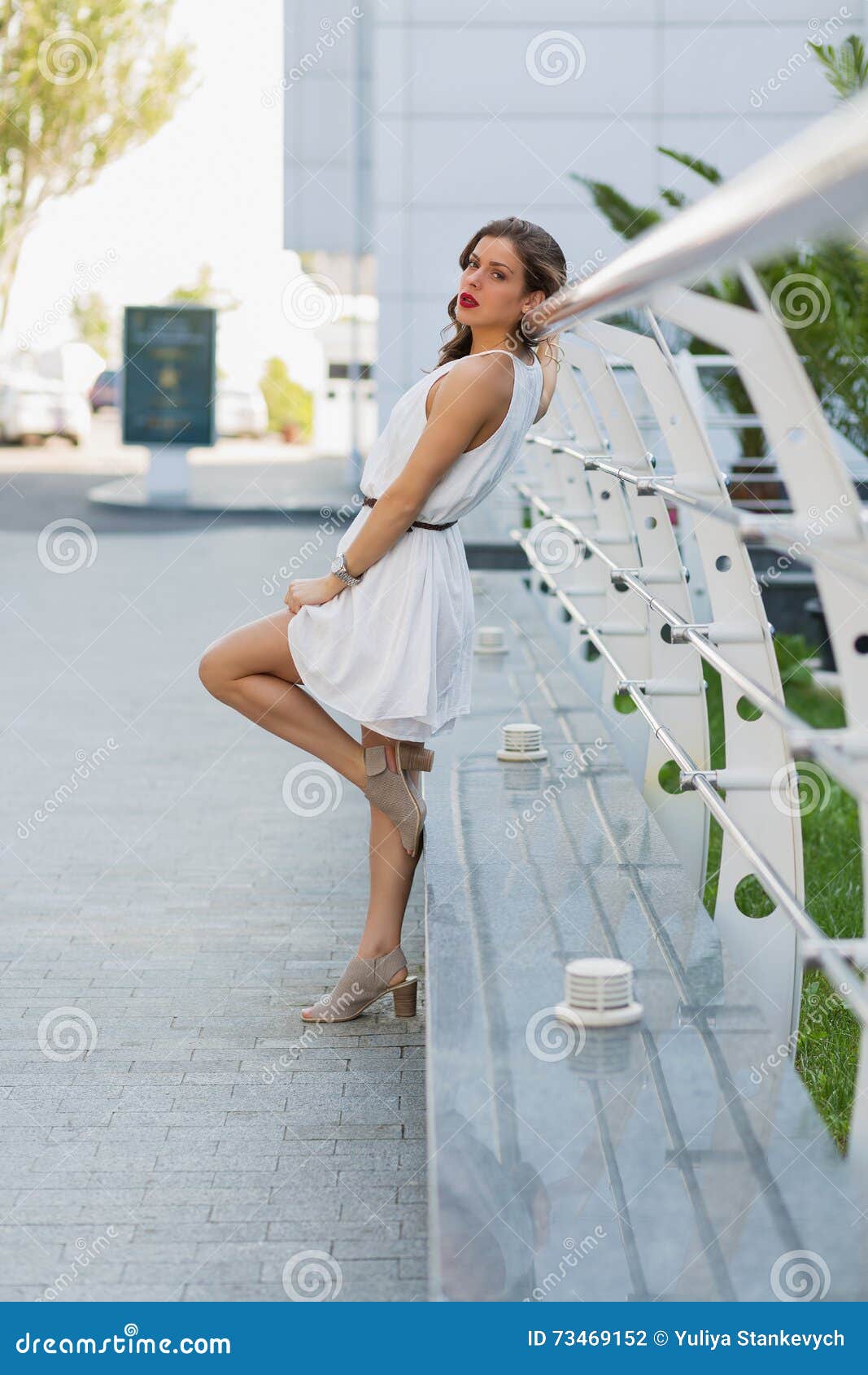 Beautiful Stylish Woman Standing on the Street Stock Photo - Image of ...