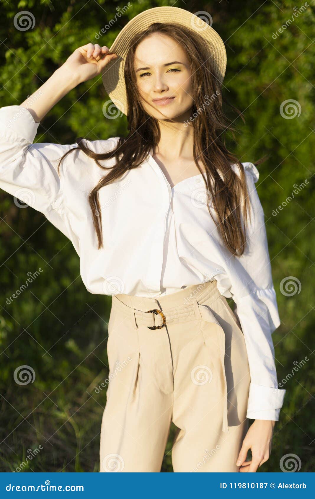 Beautiful Stylish Young Girl Wearing a Trendy White Shirt, Beige Stock ...