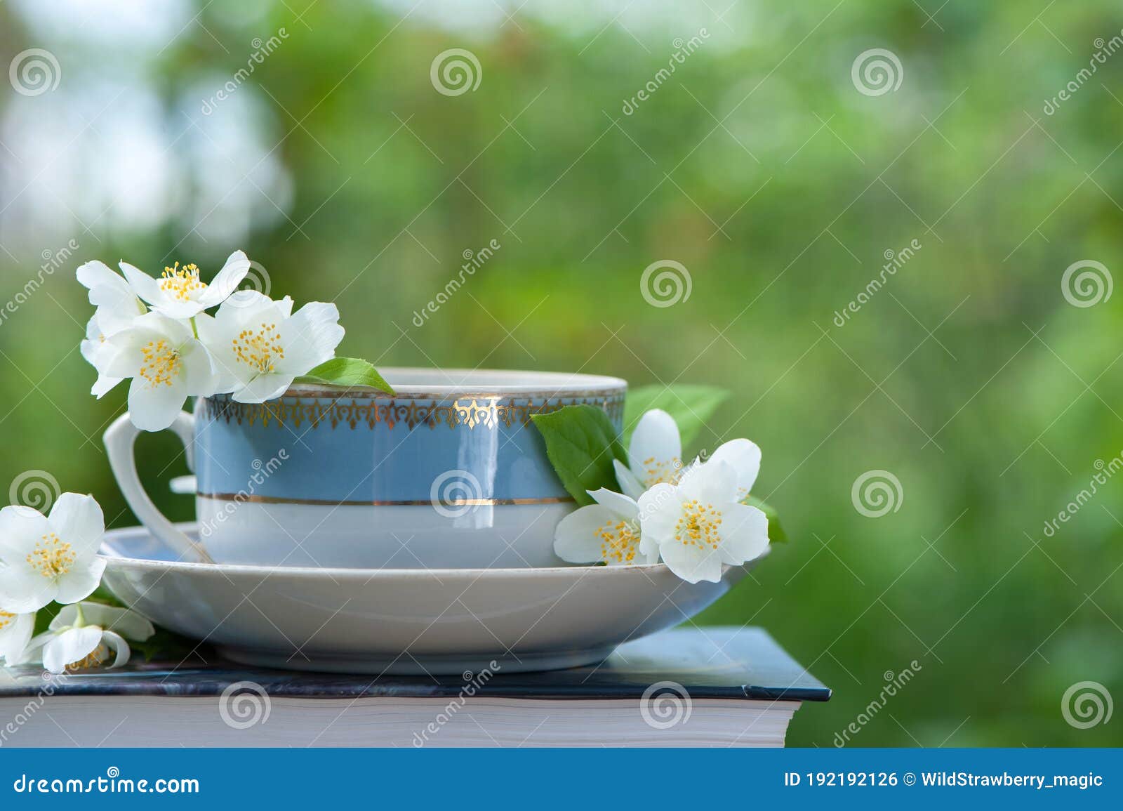 Beautiful Summer Composition of a Cup of Tea, Book and Jasmine ...