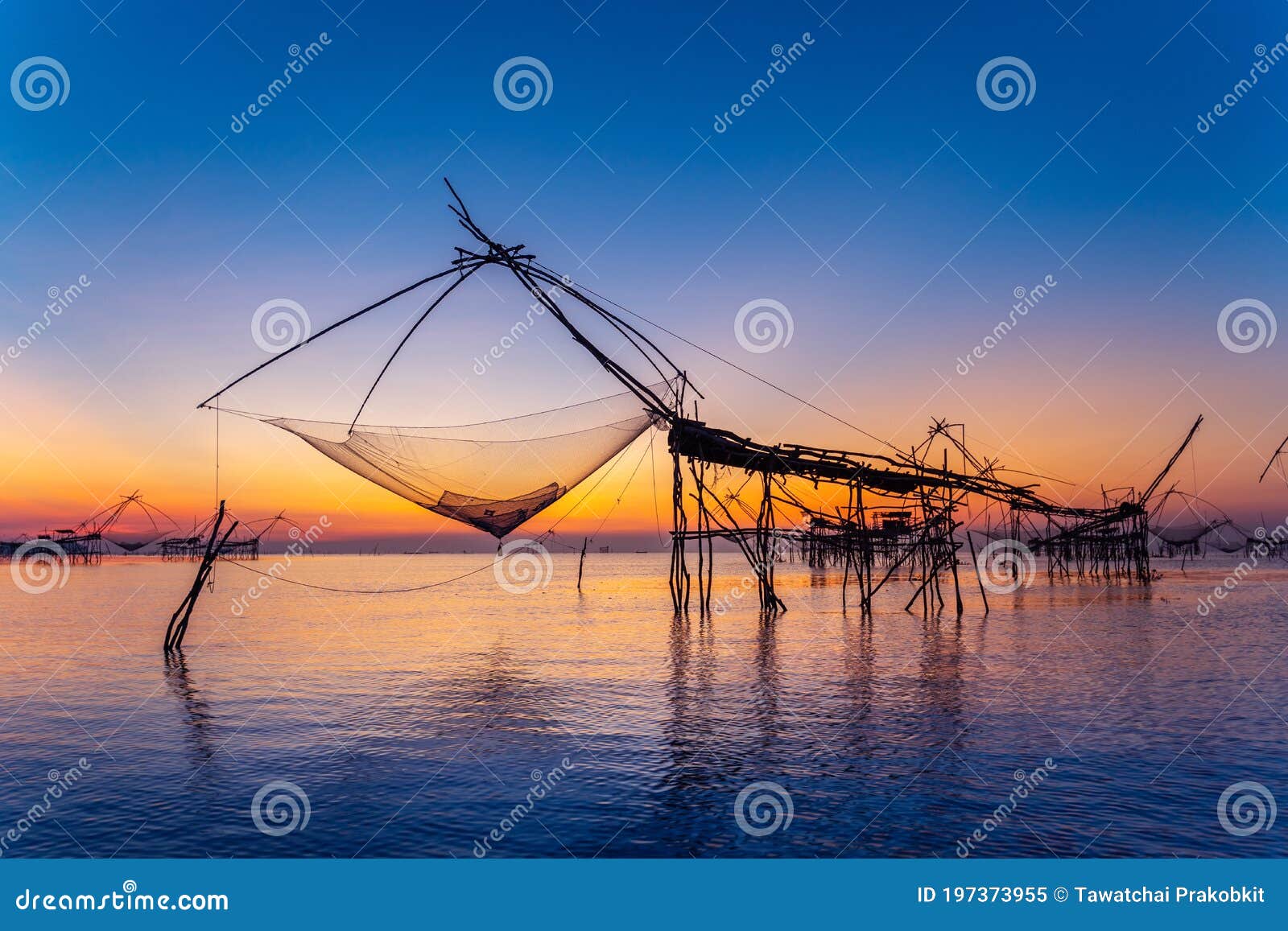 Beautiful Sunrise and Fishing Dip Nets at Pakpra in Phatthalung