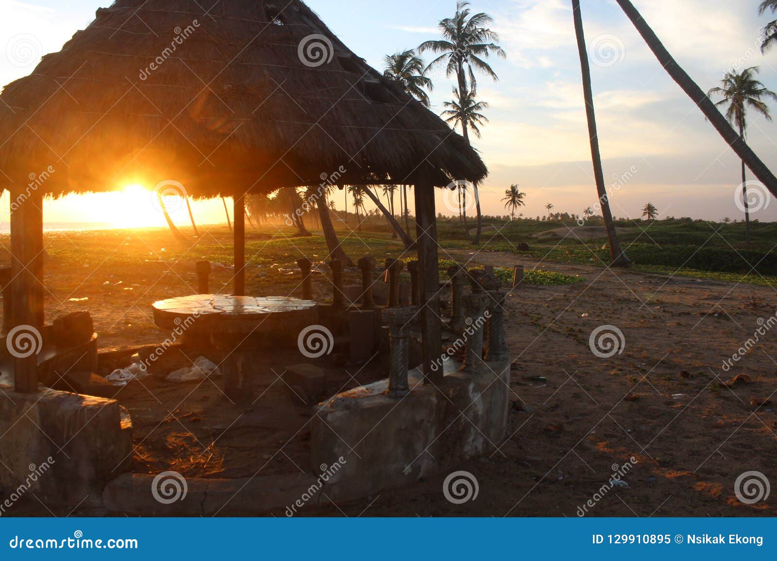 beautiful sunset through a beach hut