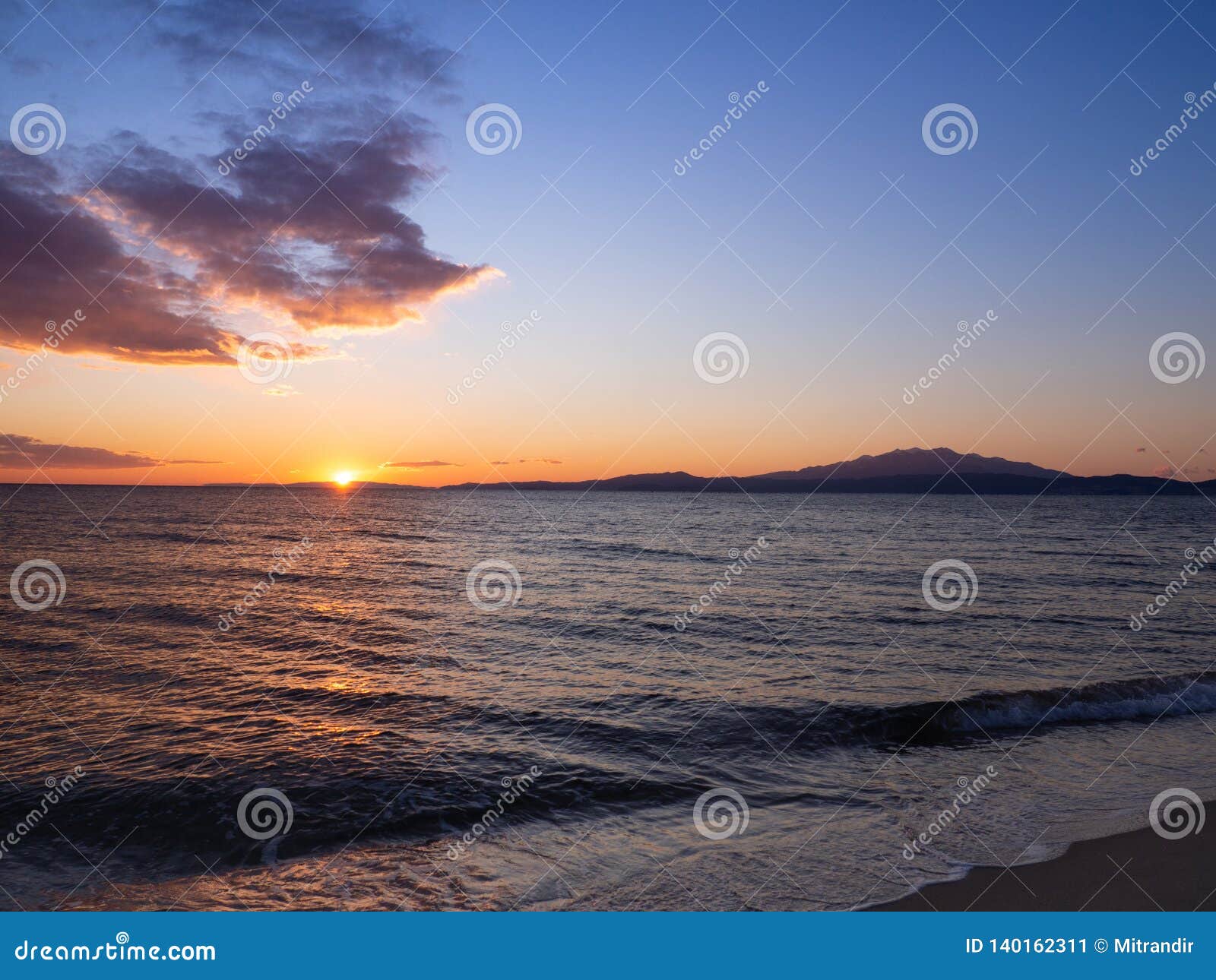 beautiful sunset on the beaches of kavala, greece