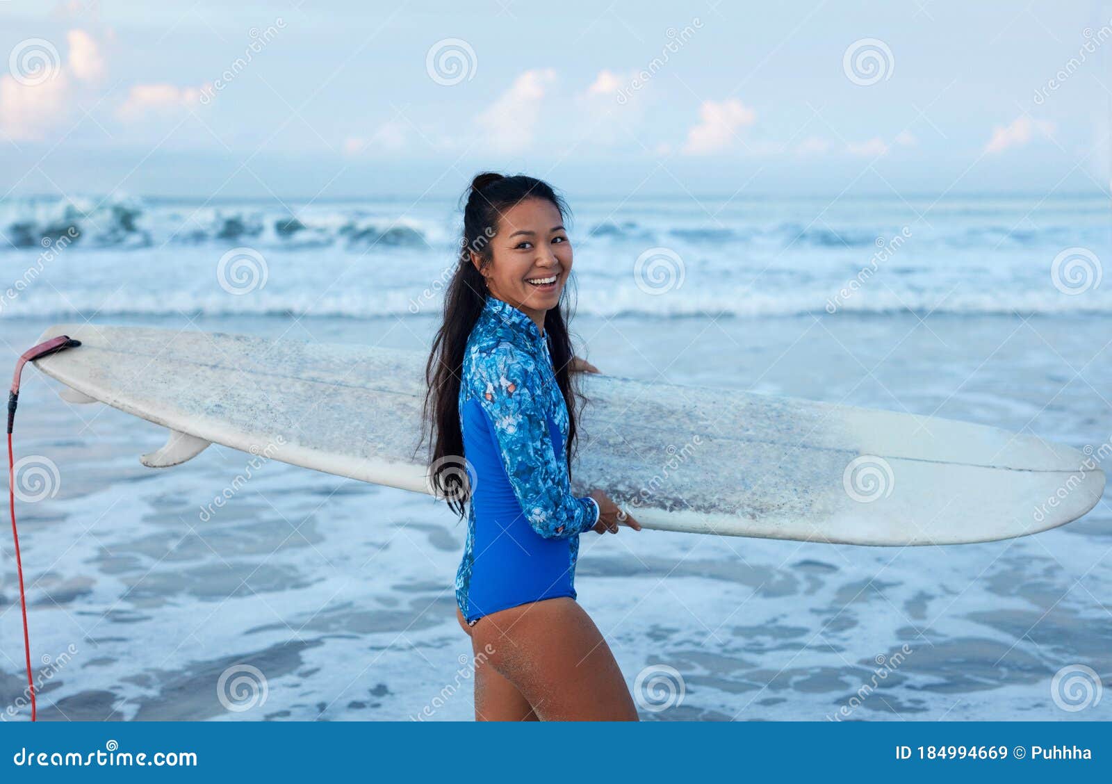 Beautiful Surfer Girl Surfing Woman With Surfboard Smiling Brunette Going To Surf In Ocean