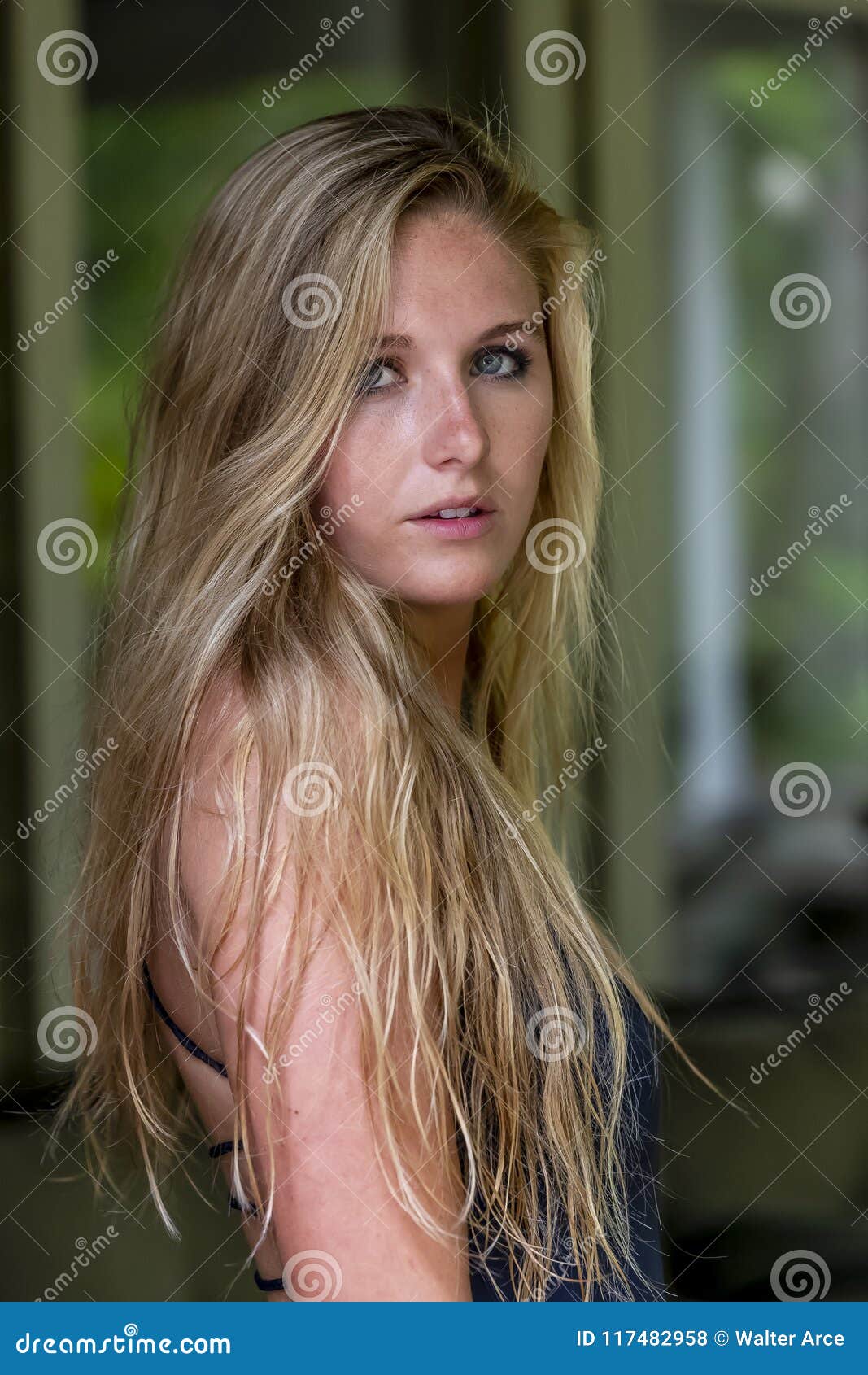 Beautiful Swimsuit Blonde College Coed Poses In A Home Environment 