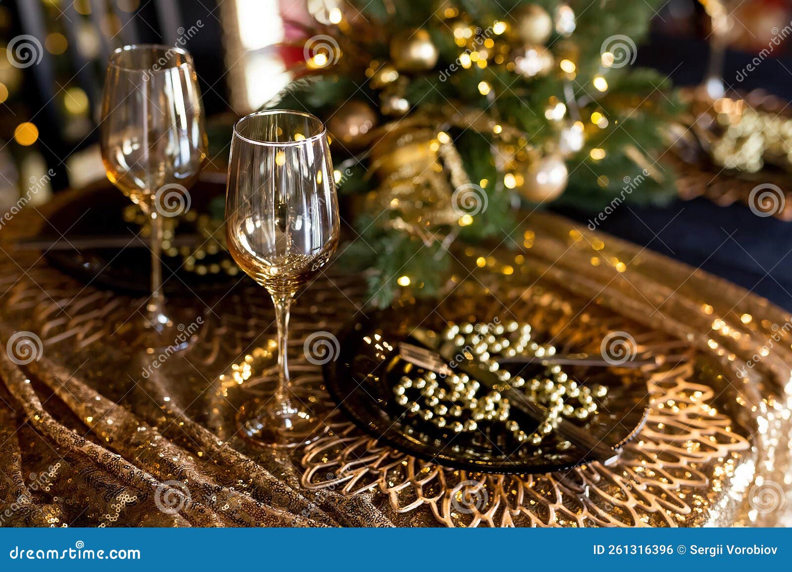 Beautiful Table Setting with Christmas Decorations in Living Room Stock