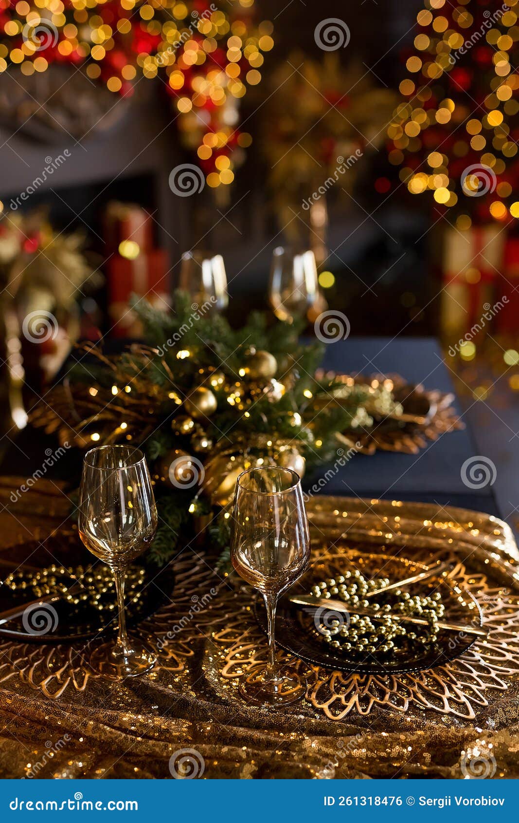 Beautiful Table Setting with Christmas Decorations in Living Room Stock