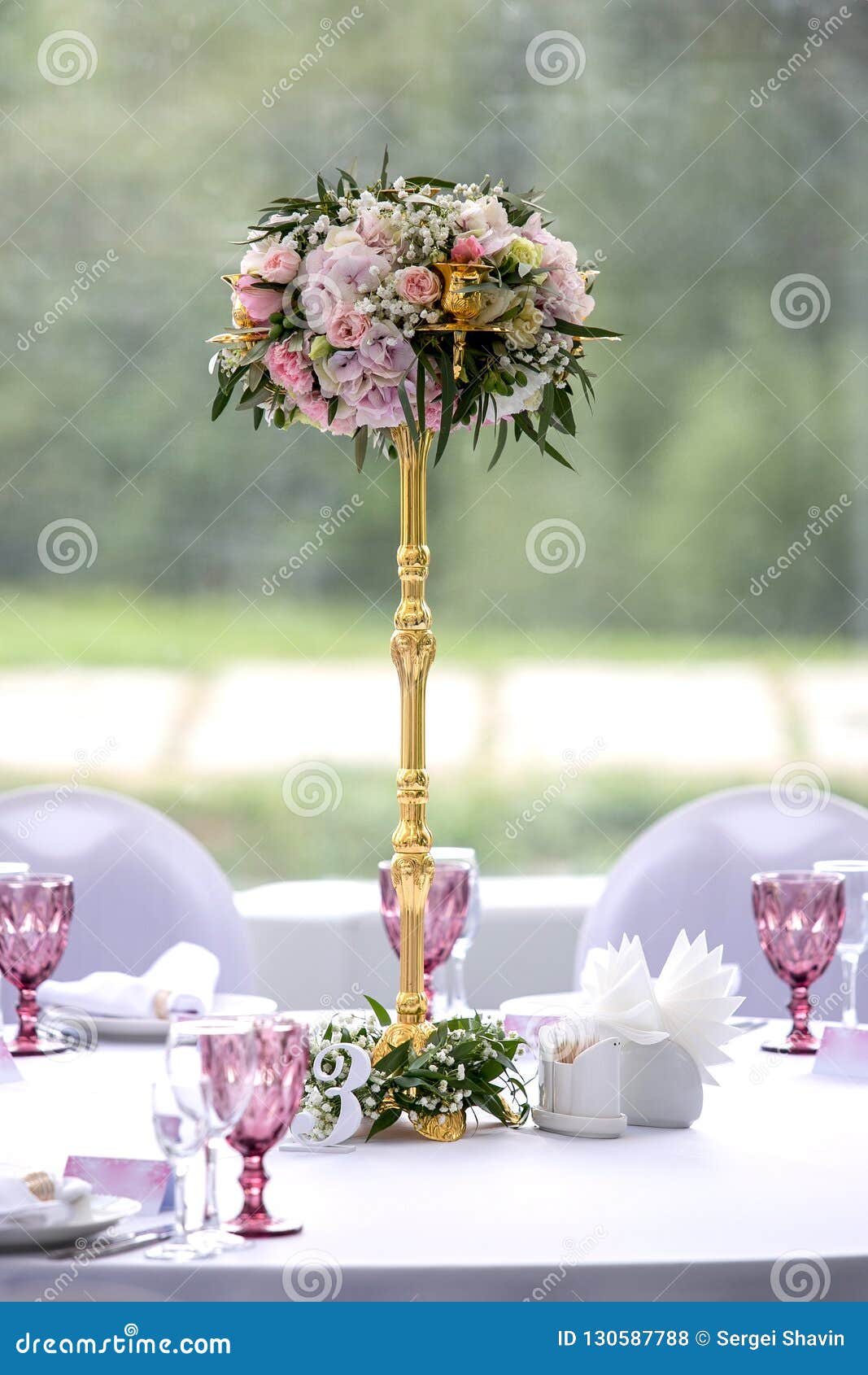 Beautiful Setting with Crockery and Arrangement in a Vase on a Stem for a Party, Wedding Reception or Other Stock Photo - Image of festive, banquet: 130587788
