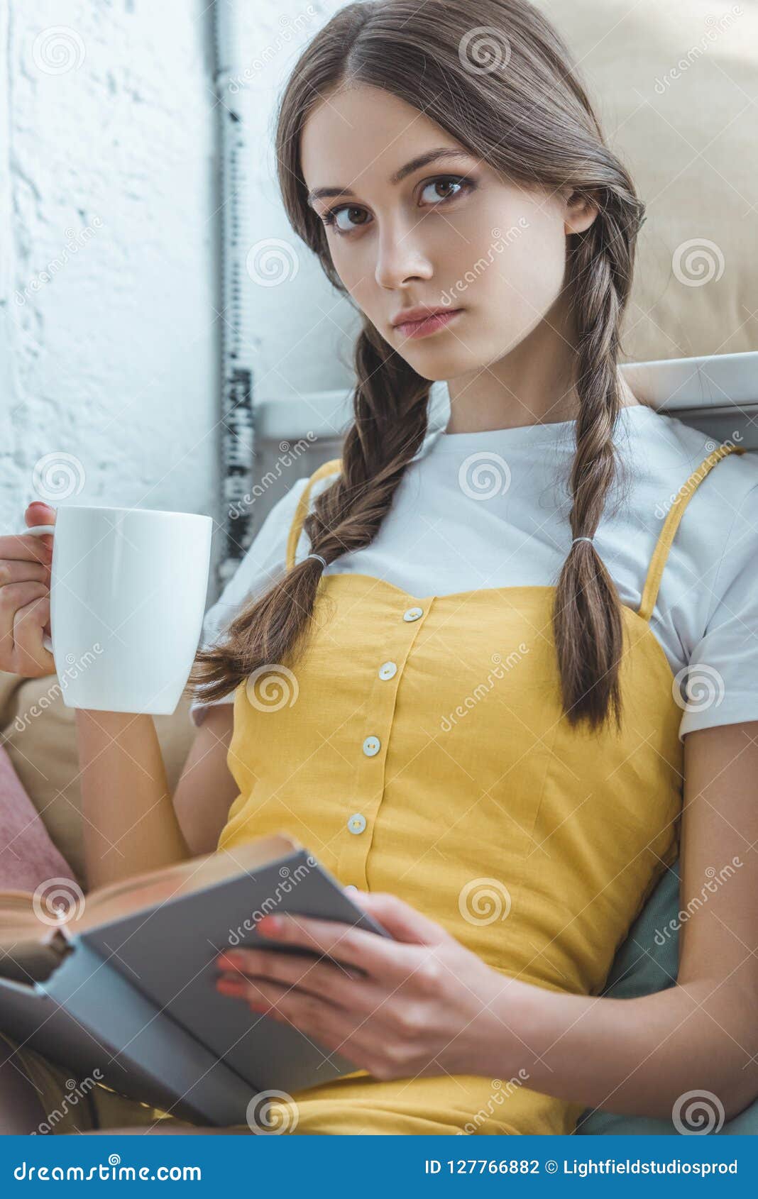 https://thumbs.dreamstime.com/z/beautiful-teen-girl-cup-coffee-beautiful-teen-girl-cup-coffee-book-127766882.jpg