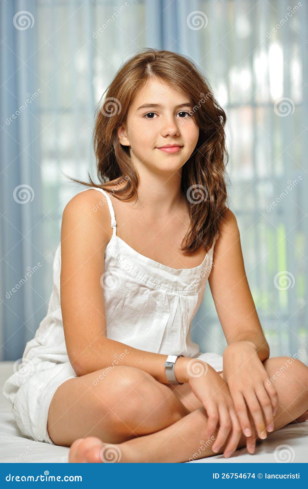 Beautiful Teen Girl At Home In White Dress Stock Photography